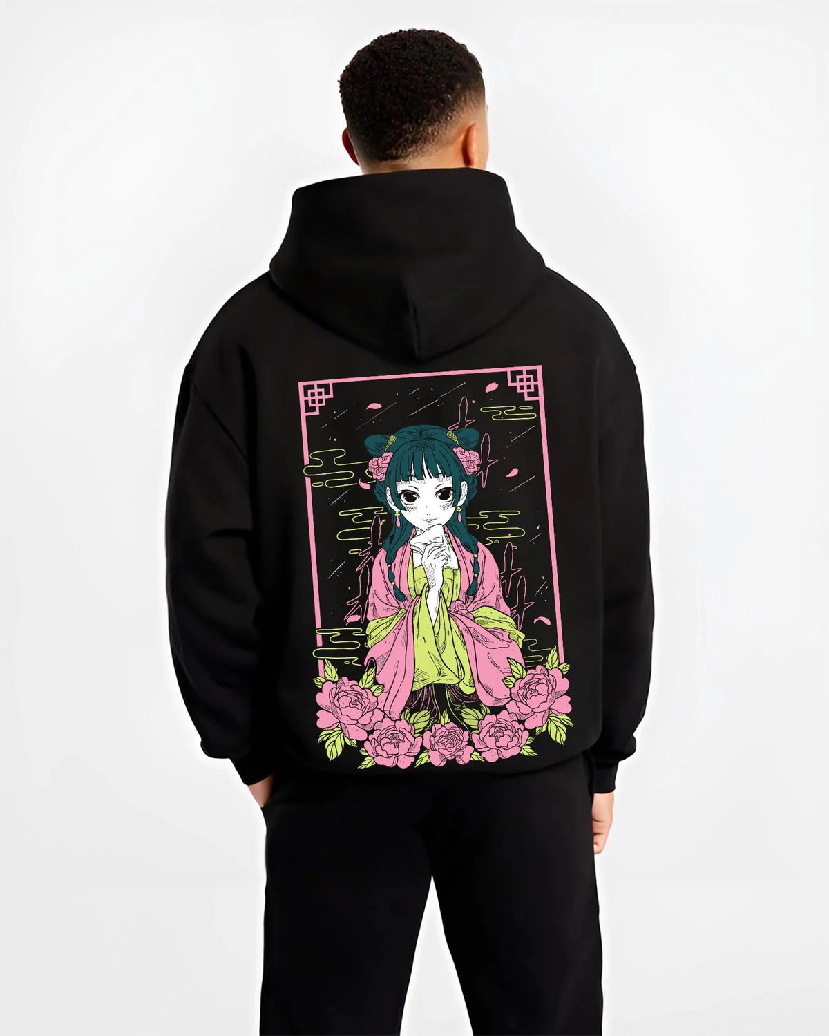 Black hoodie worn by male model from the back featuring Maomao floral herbalist portrait artwork.