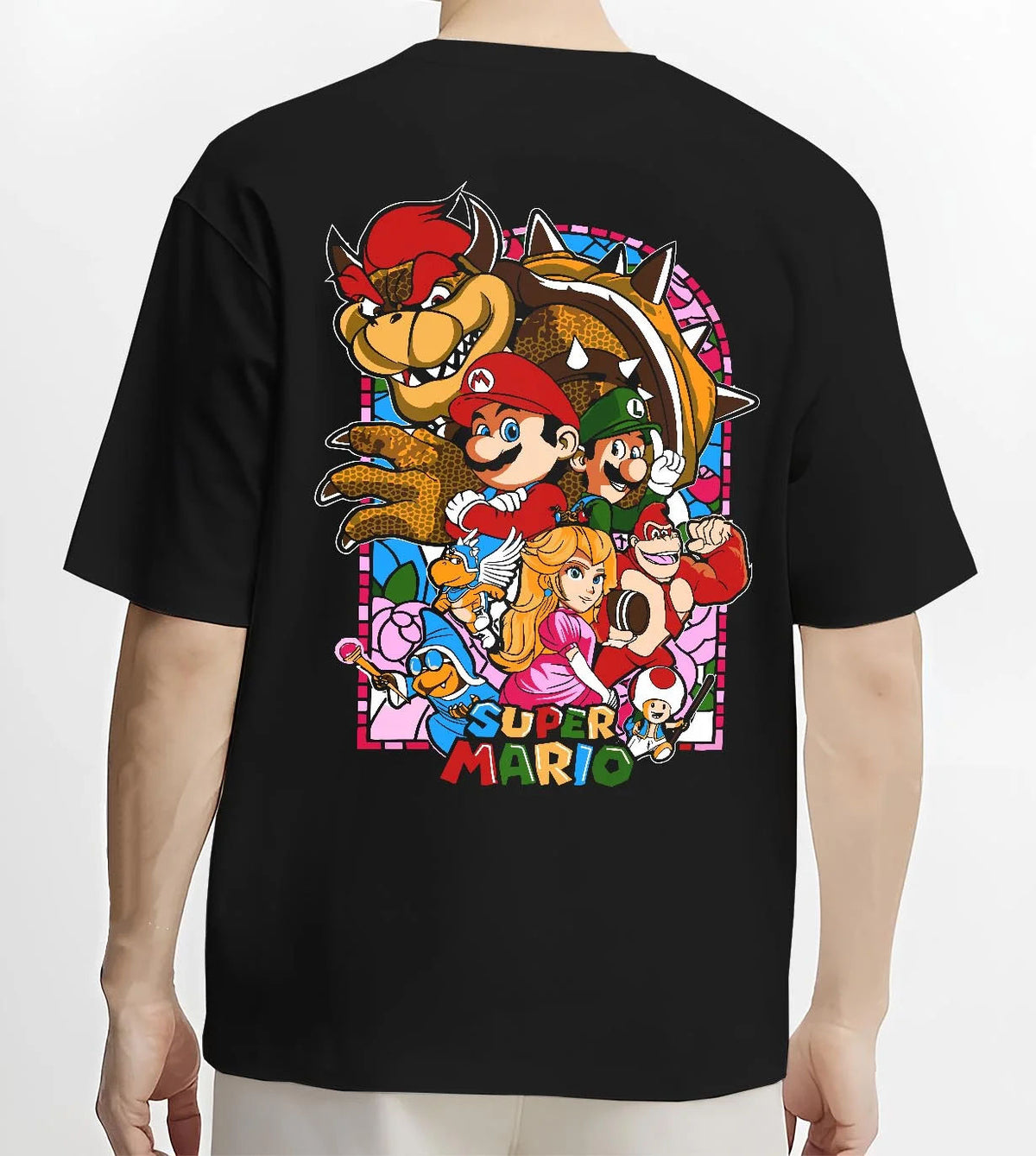 Black T-shirt worn by male model from the back featuring Mario and the Mushroom Kingdom cast artwork.