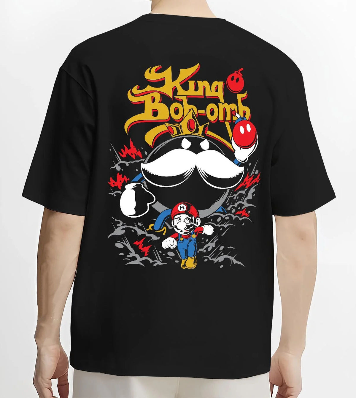 Black T-shirt worn by male model from the back featuring Mario and King Bob-omb artwork.