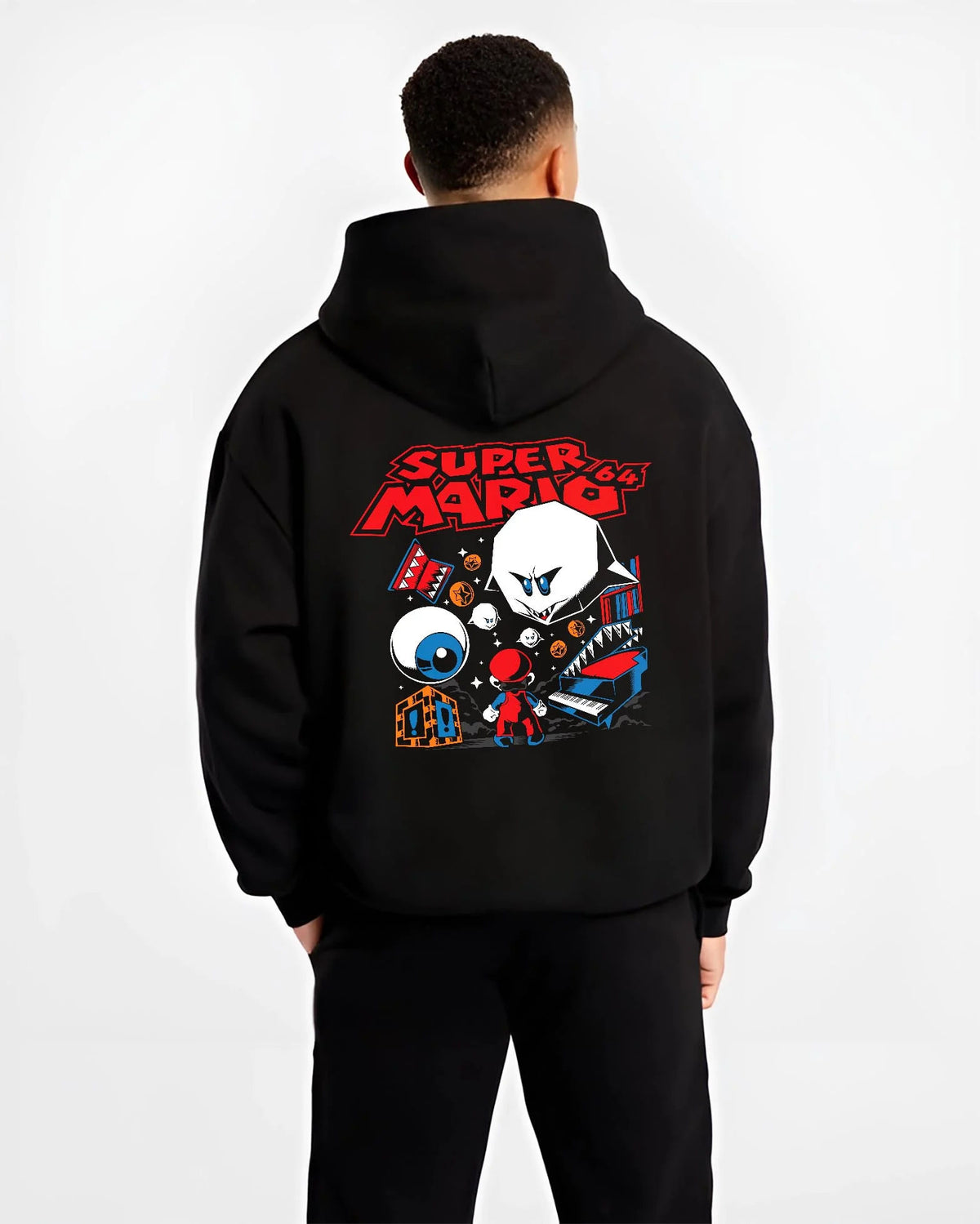 Black hoodie worn by male model from the back featuring Mario with Boo ghost arcade imagery artwork.