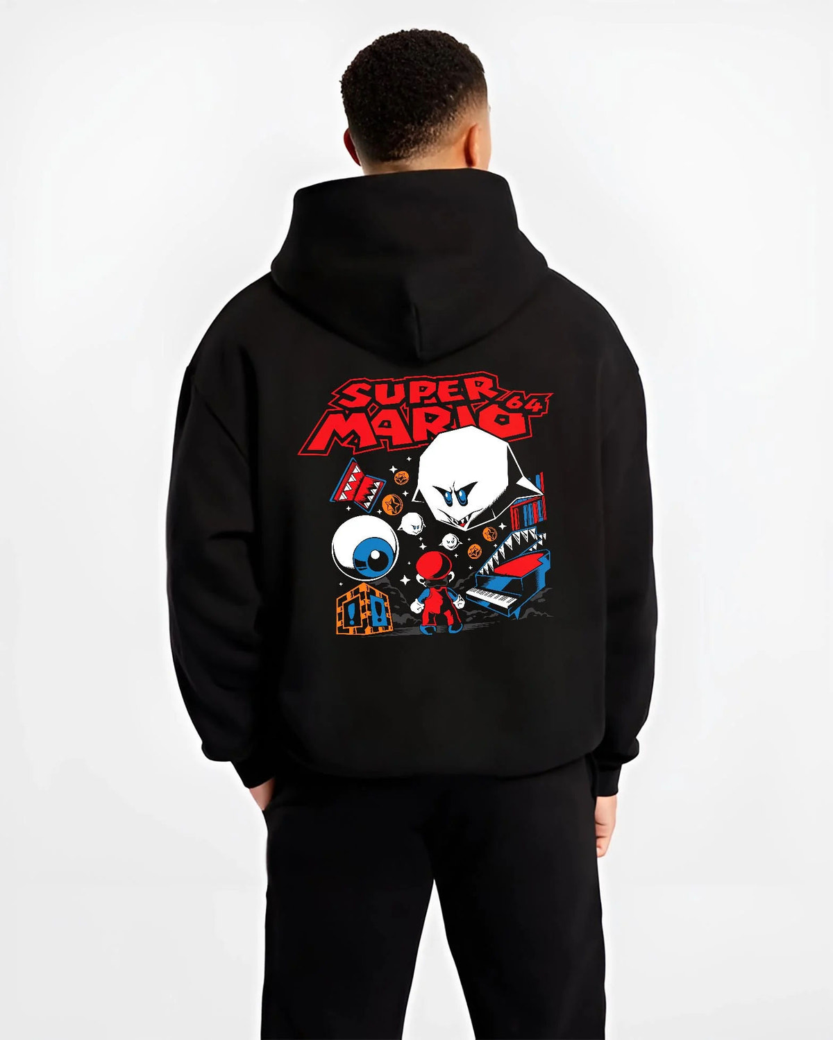 Black hoodie worn by male model from the back featuring Mario with Boo ghost arcade imagery artwork.