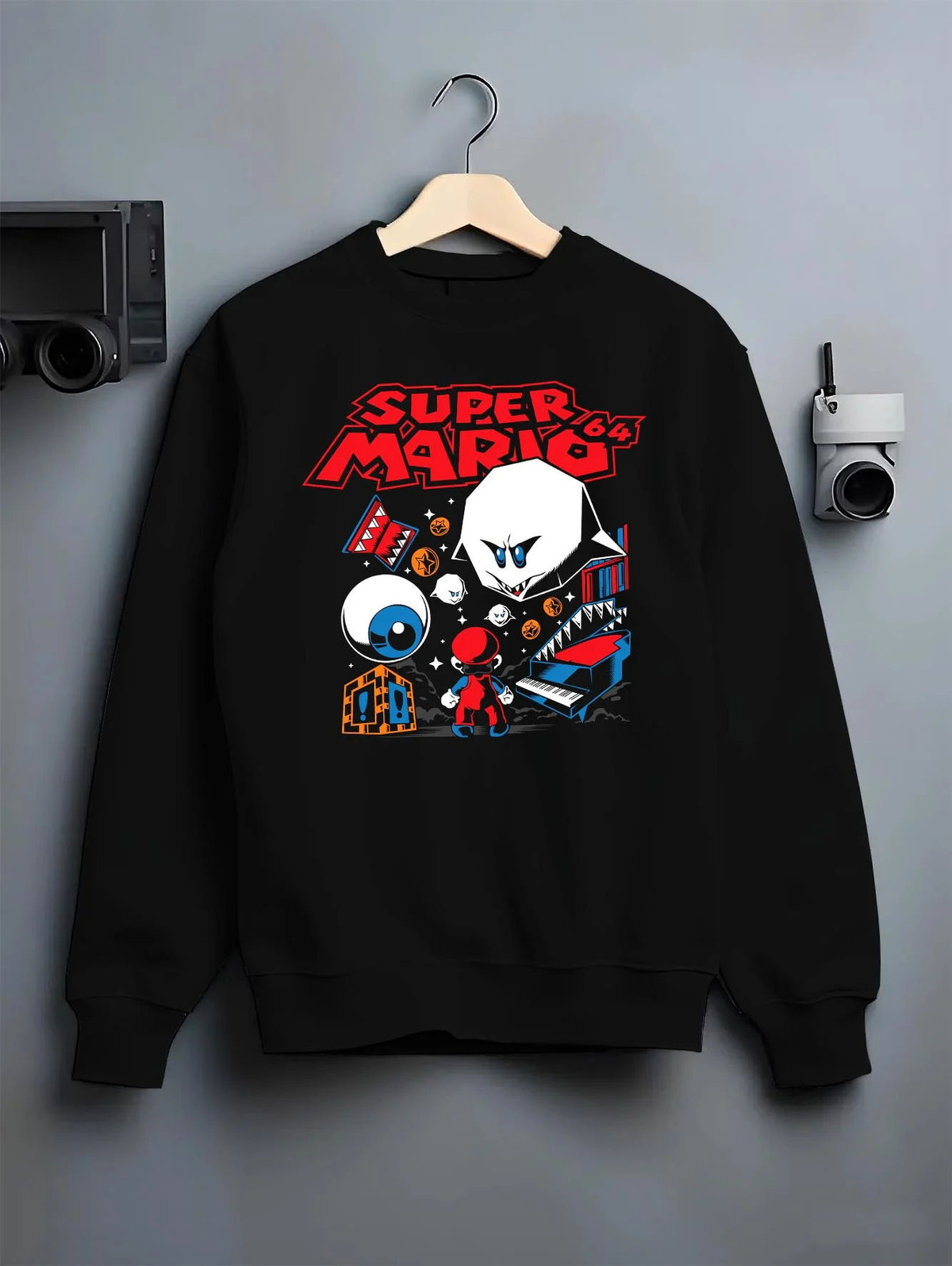 Black crewneck sweatshirt on hanger featuring Mario with Boo ghost arcade imagery artwork.