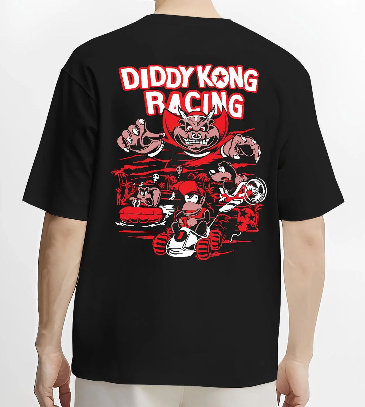Black T-shirt worn by male model from the back featuring Diddy Kong Racing kart action artwork.