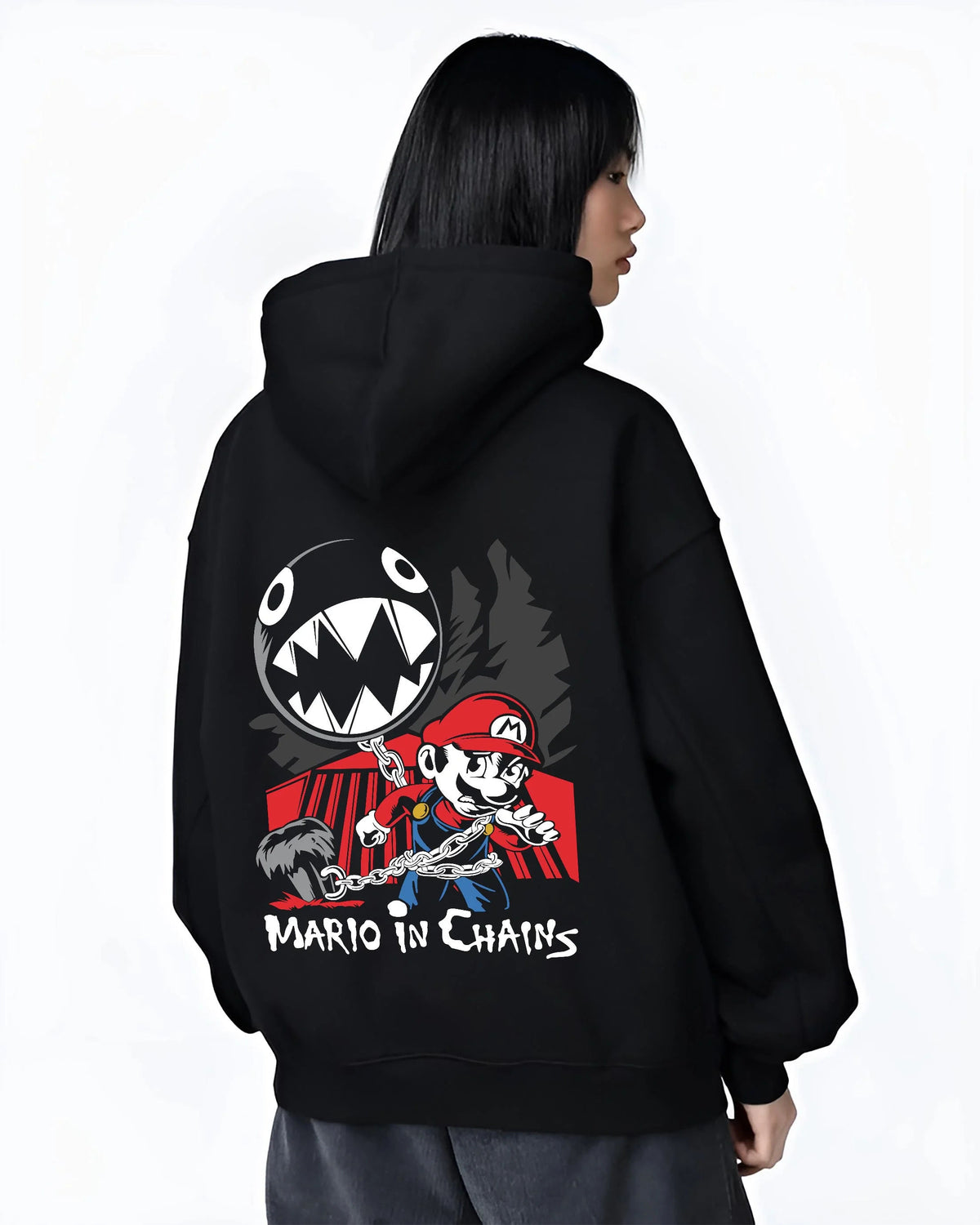 Black hoodie worn by female model from the back featuring Mario and Chain Chomp artwork.