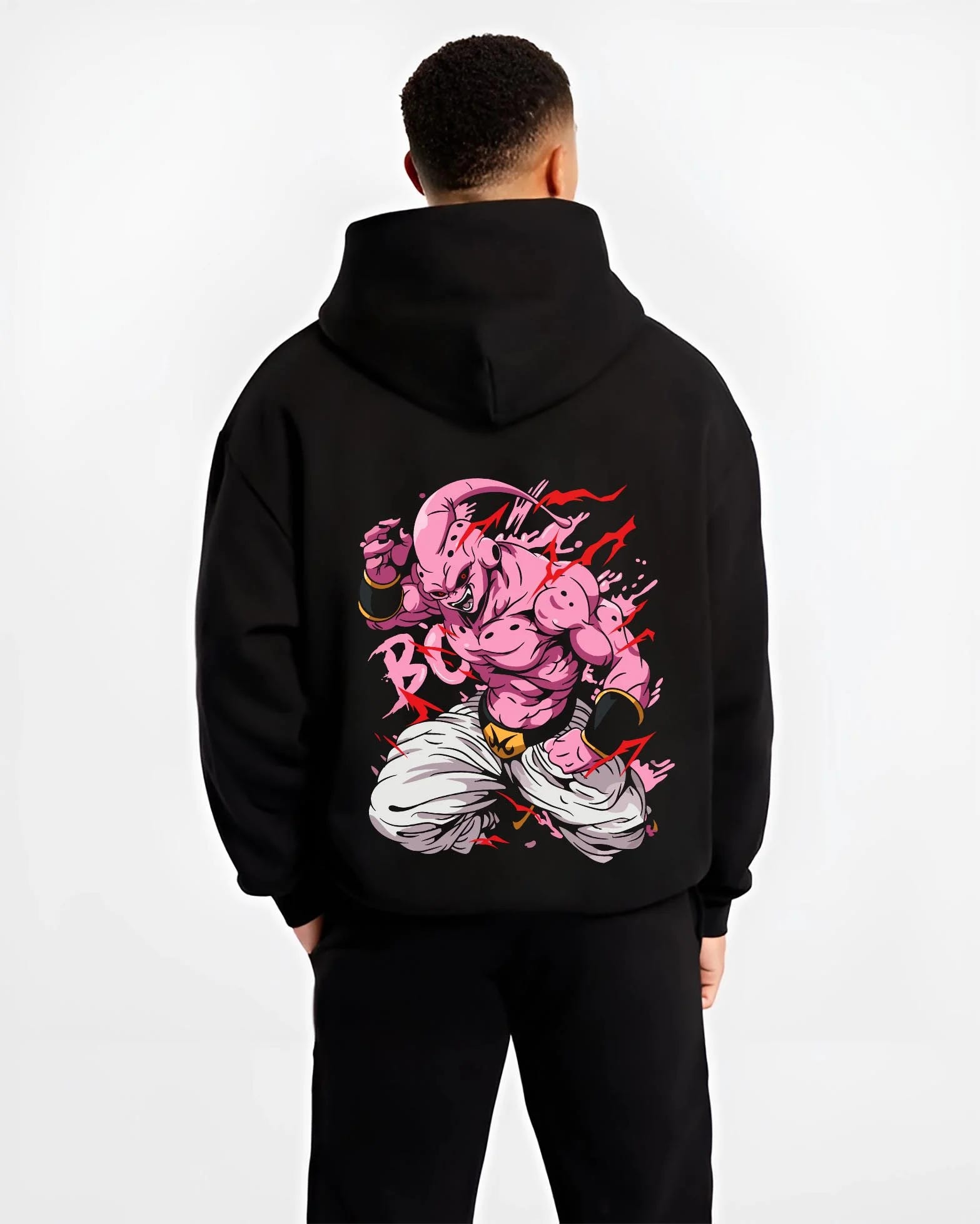 Black hoodie worn by male model, back view with Majin Buu Kid Hoodie Dragon Ball Z Chaos Power graphic streetwear graphic.