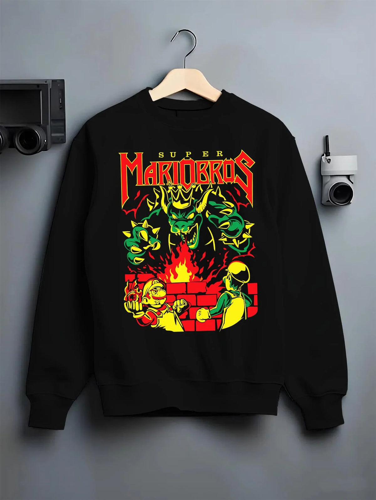 Black crewneck sweatshirt on hanger featuring Mario, Bowser and the Koopa crew artwork.