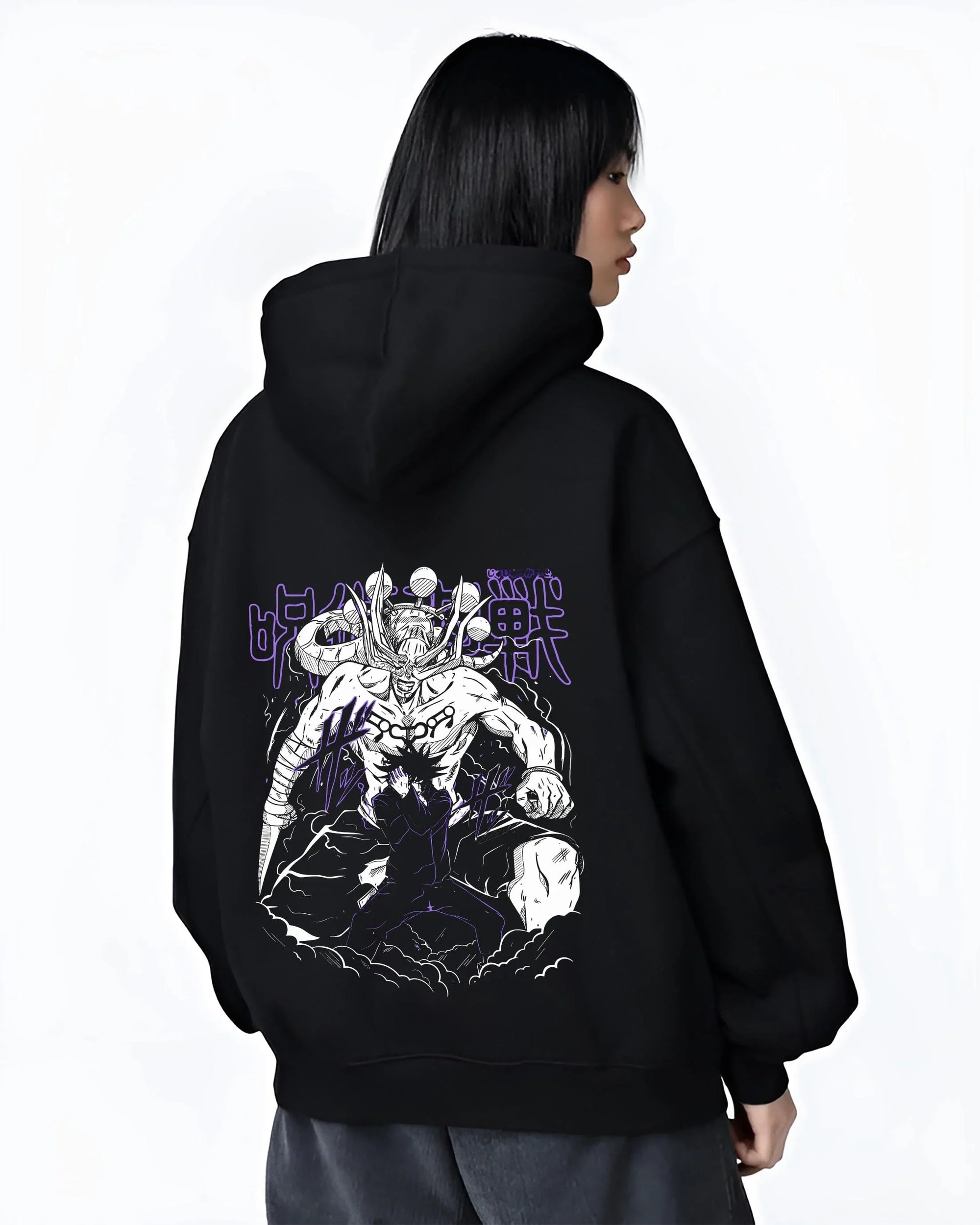 Black hoodie worn by female model, back view, featuring Japanese animation streetwear print of Mahoraga Shikigami battle scene with Megumi.