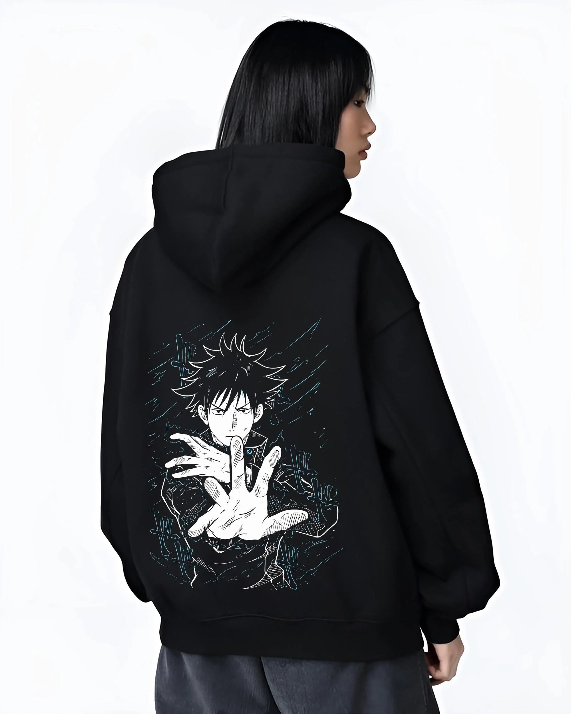 Black hoodie worn by female model, back view with Megumi Fushiguro Hoodie Jujutsu Kaisen Shadows graphic streetwear graphic.