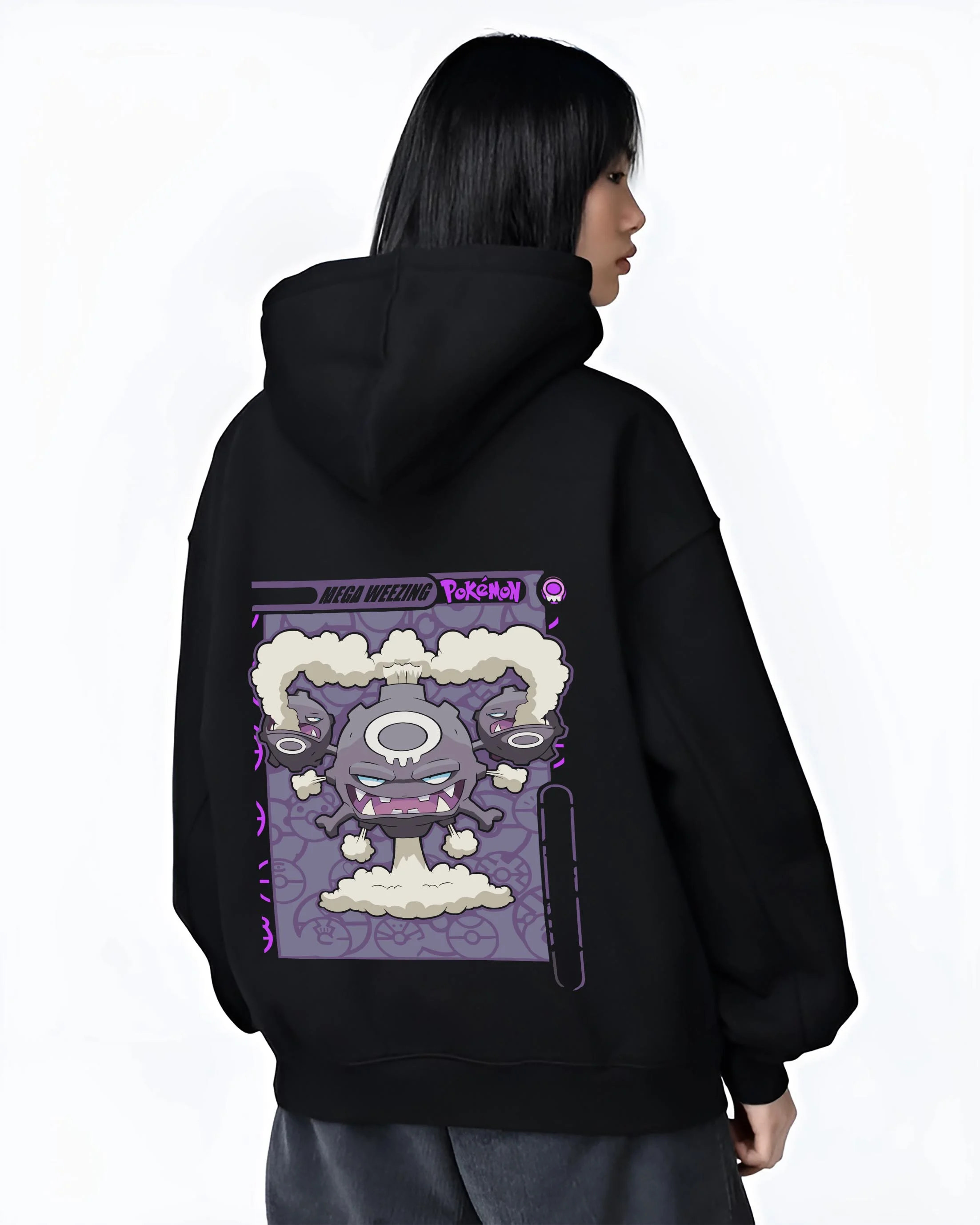 Black hoodie worn by female model, back view with Weezing Hoodie Pokémon Mega Evolution Card graphic bold anime graphic.