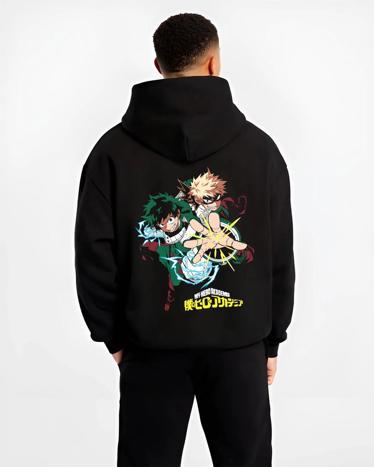 Black hoodie worn by male model, back view with Deku Bakugo Hoodie My Hero Academia Training Arc graphic premium wear.