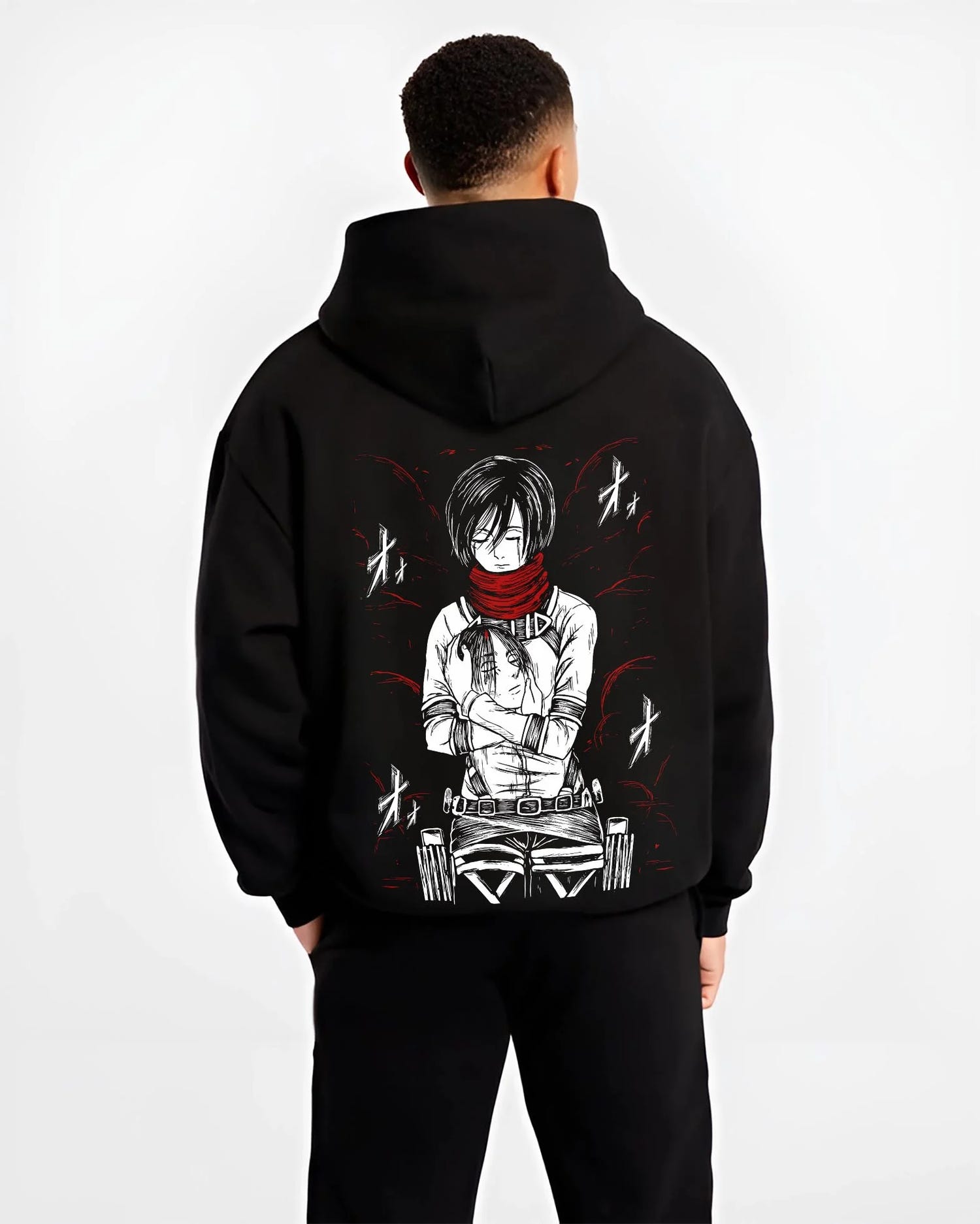 Black hoodie worn by male model, back view with Mikasa Ackerman Hoodie Attack on Titan Winter Gear graphic streetwear graphic.