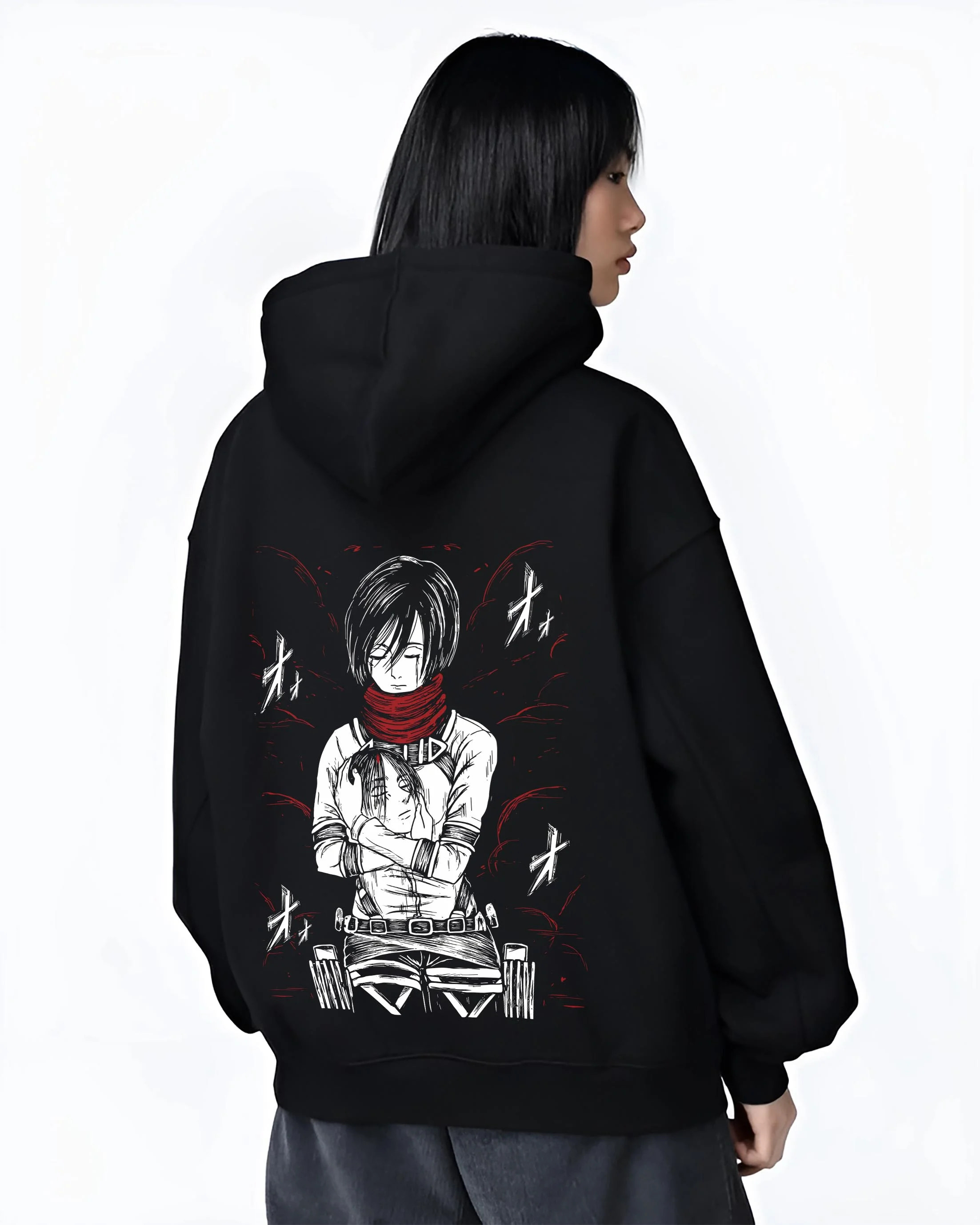 Black hoodie worn by female model, back view with Mikasa Ackerman Hoodie Attack on Titan Winter Gear graphic bold anime graphic.