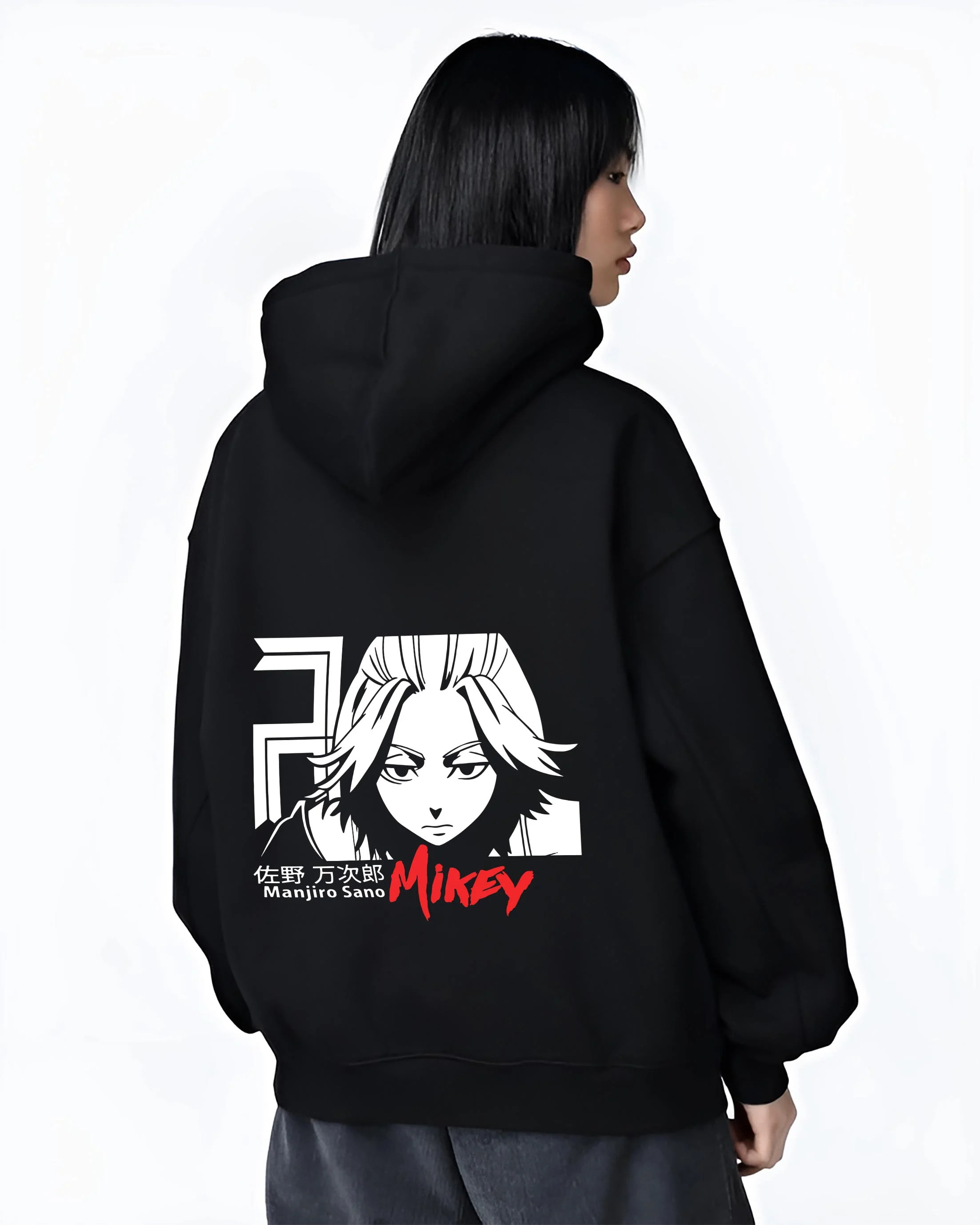 Black hoodie worn by female model, back view with Manjiro Sano Hoodie Tokyo Revengers Mikey Iconic graphic bold anime graphic.