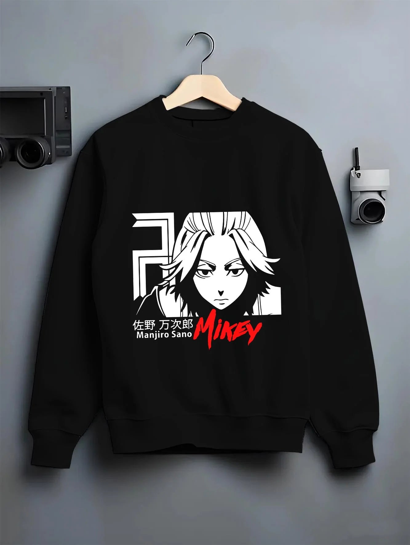 Black crewneck sweatshirt on hanger with Manjiro Sano Hoodie Tokyo Revengers Mikey Iconic graphic premium wear.
