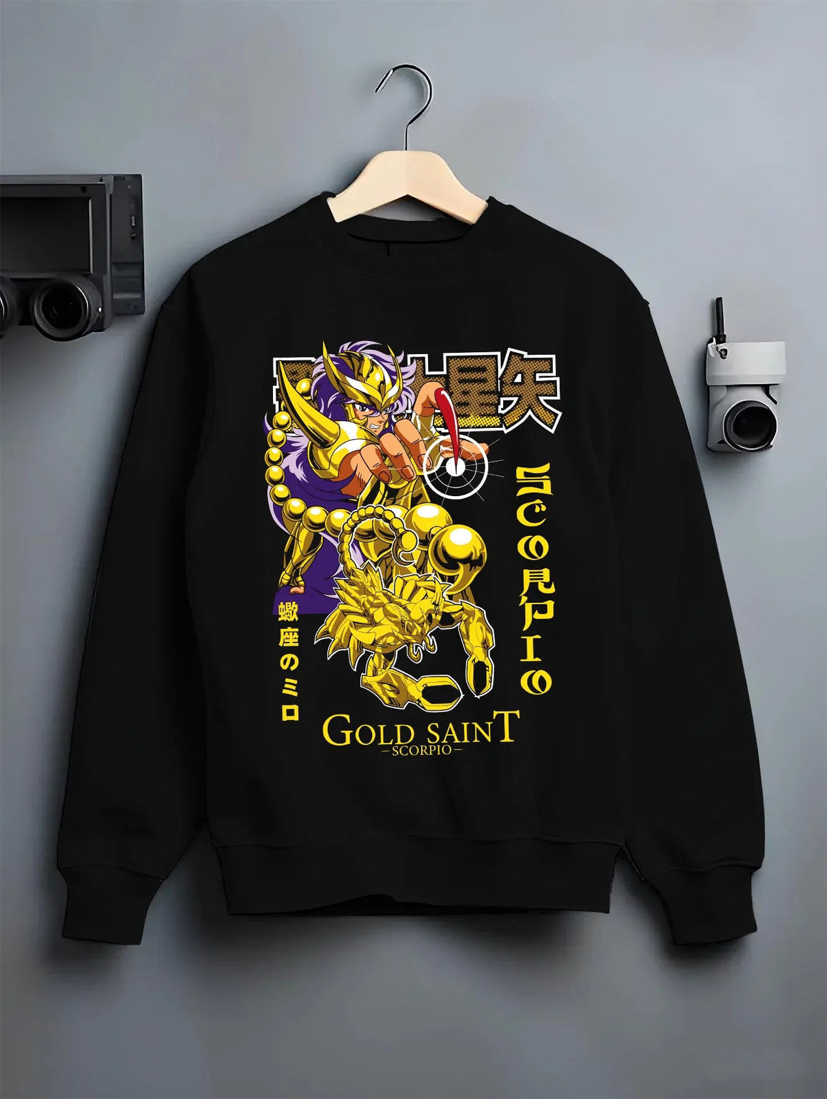Black crewneck sweatshirt on hanger featuring Scorpio Milo Gold Saint artwork.
