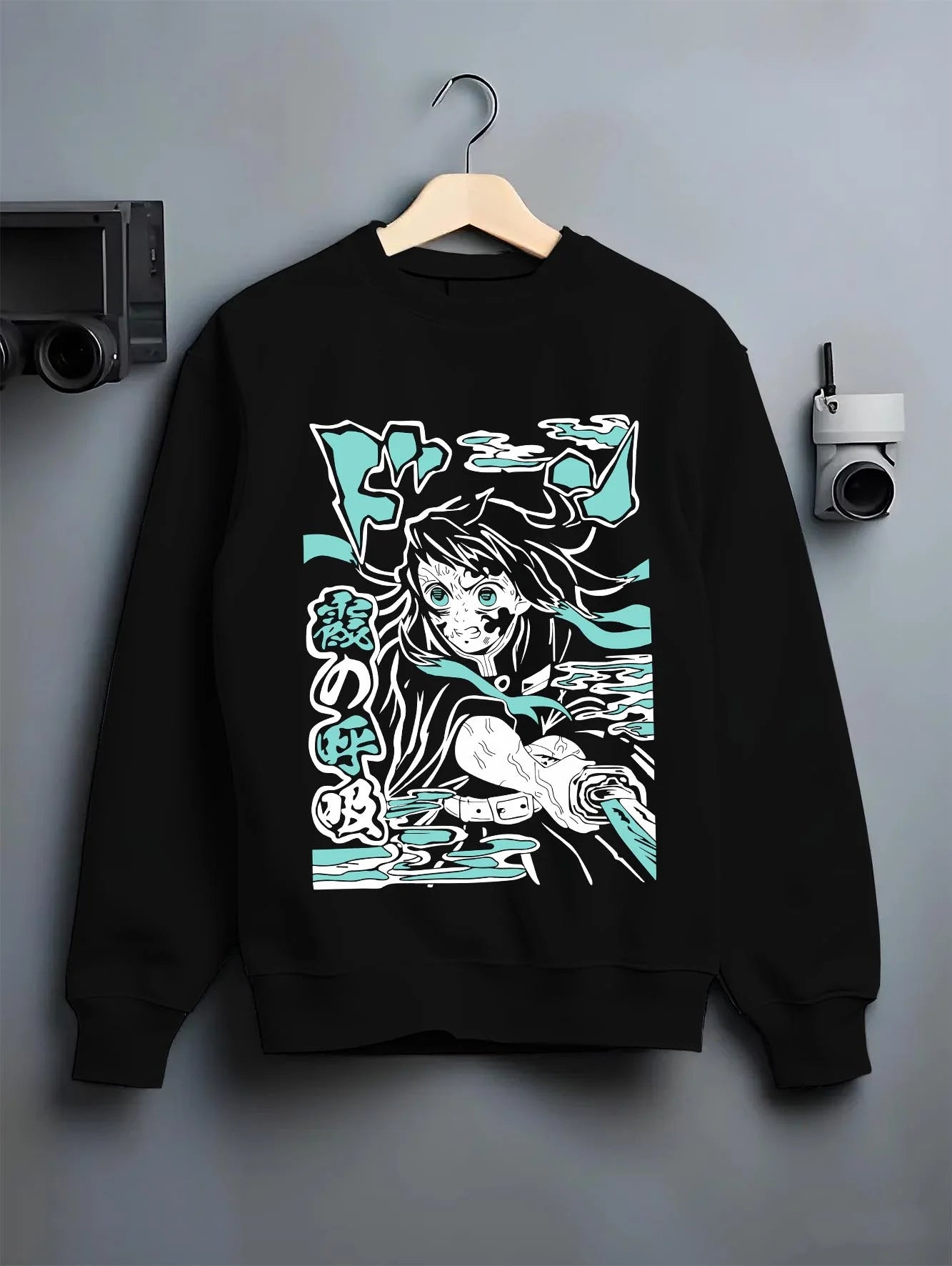 Black crewneck sweatshirt on hanger with Nezuko Kamado Hoodie Demon Slayer Transformation graphic premium wear.