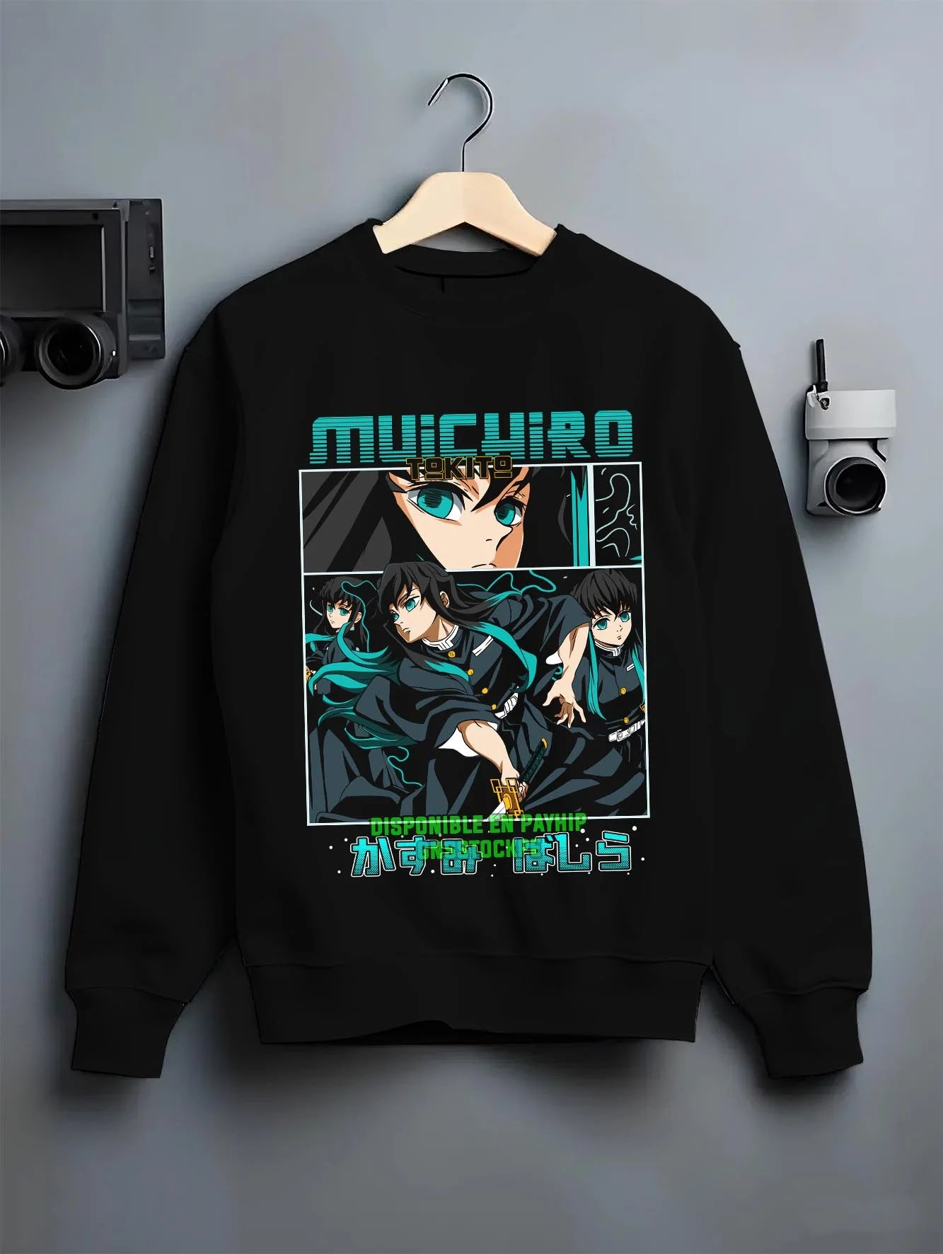 Black crewneck sweatshirt on hanger with Muichiro Tokito Hoodie Demon Slayer Mist Hashira graphic bold anime graphic.