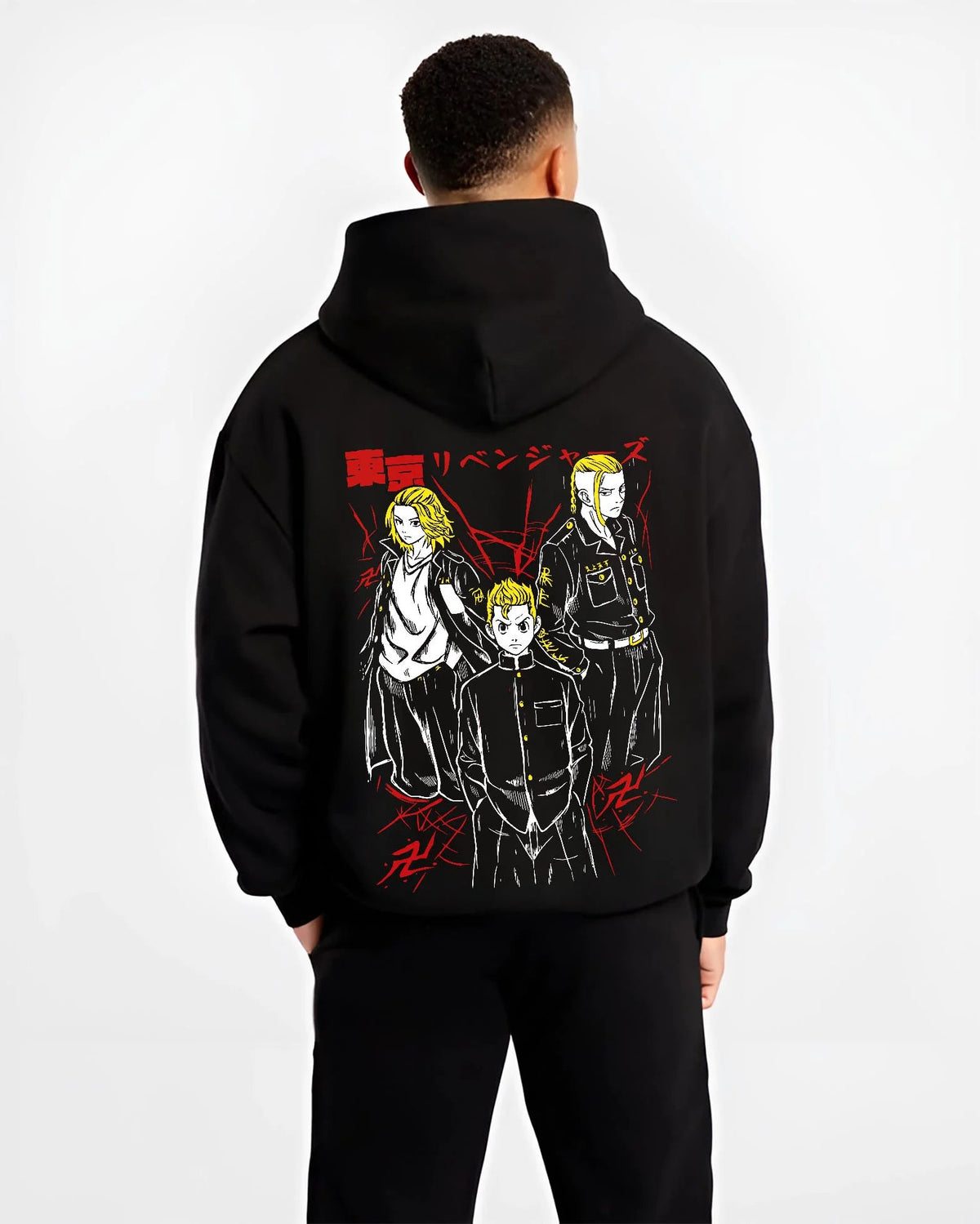 Black hoodie worn by male model from the back featuring Mikey, Draken and Mitsuya Toman trio artwork.