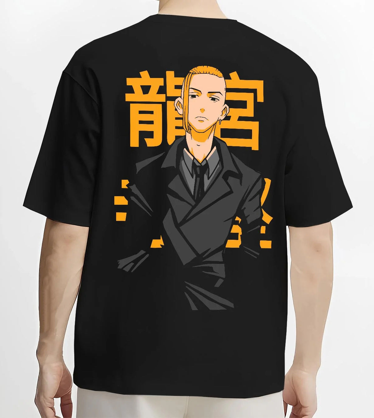 Black T-shirt worn by male model from the back featuring Manjiro Sano Mikey Toman leader artwork.