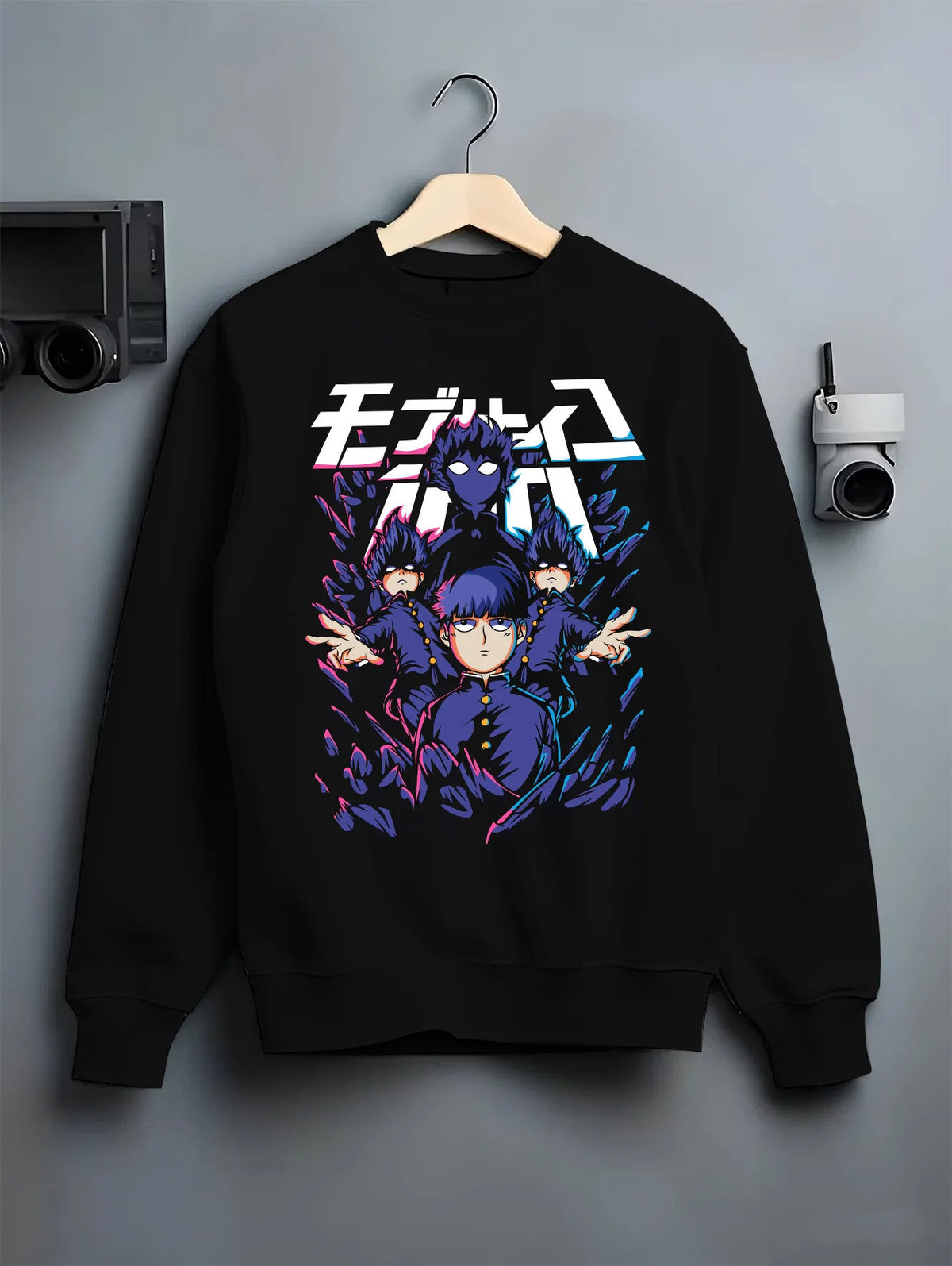 Black crewneck sweatshirt on hanger showing Mob Psycho 100: Mob and spirits and cast ensemble