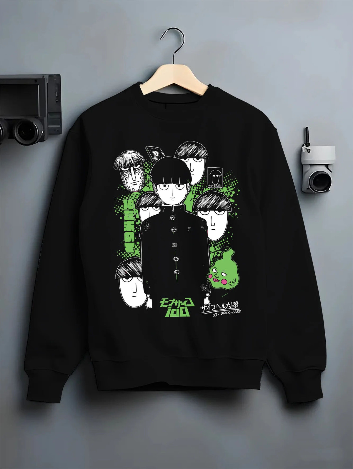 Black crewneck sweatshirt on hanger with Mob, Reigen Arataka and Mob Psycho 100 cast illustrated back graphic