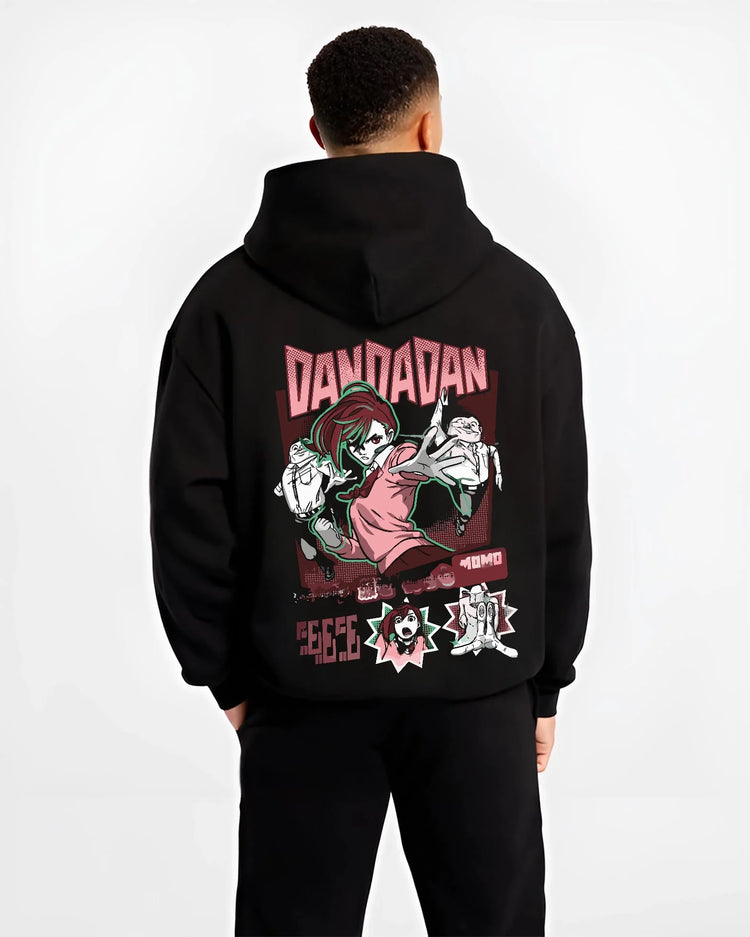 Black hoodie worn by male model, back view with Okarun Hoodie Dandadan Paranormal Spirit Battle graphic Okarun anime design.