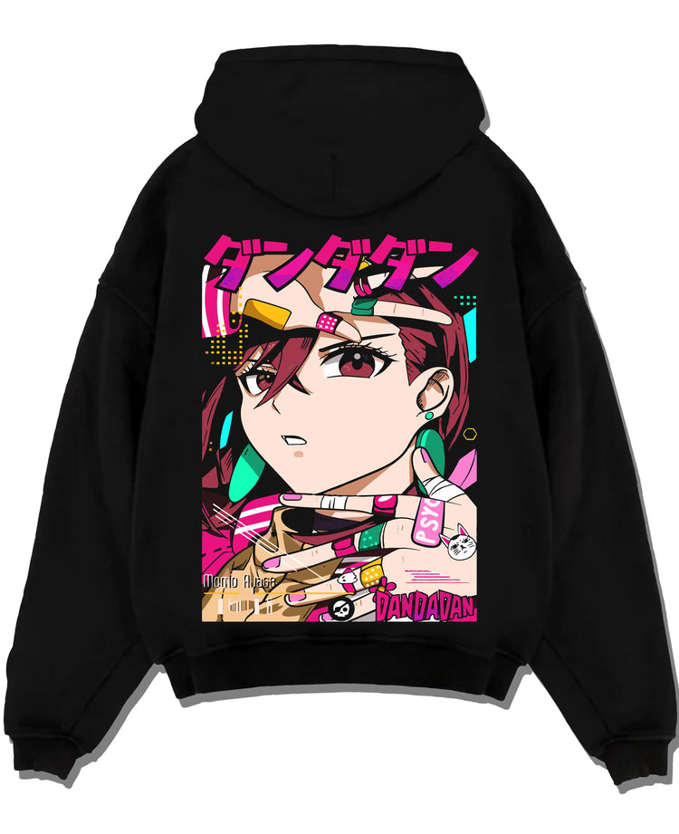 Black pullover hoodie laid flat with Momo Ayase Hoodie Dandadan Paranormal Girl Fighter graphic premium wear.