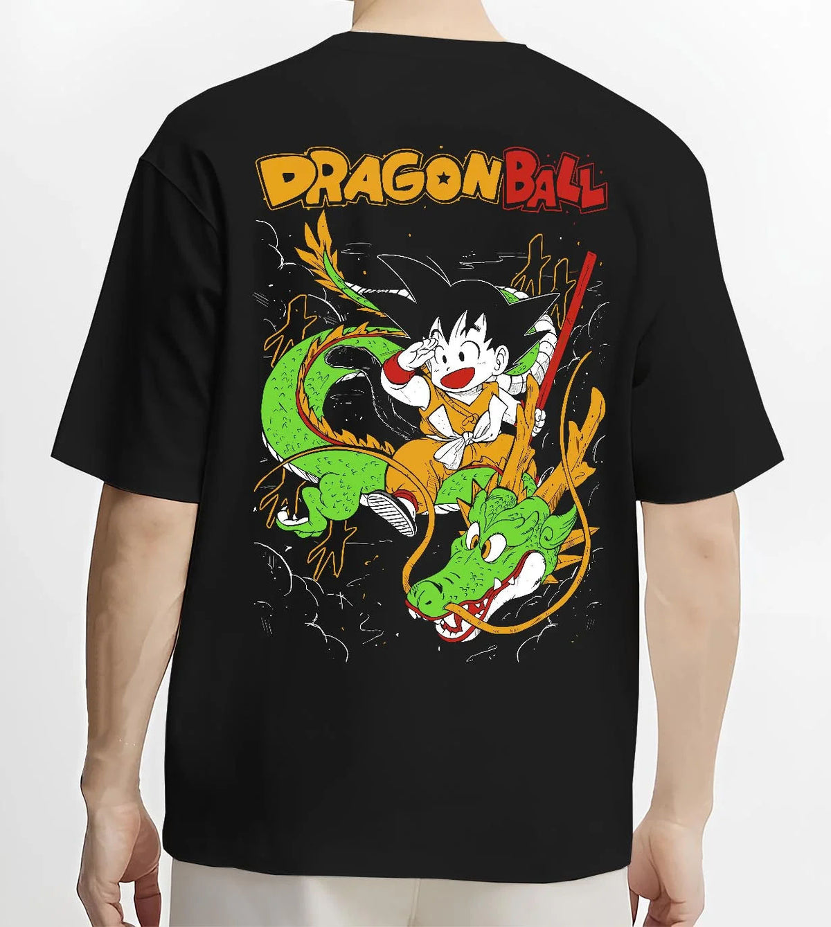 Black T-shirt worn by male model from the back featuring Kid Goku and Shenron artwork.