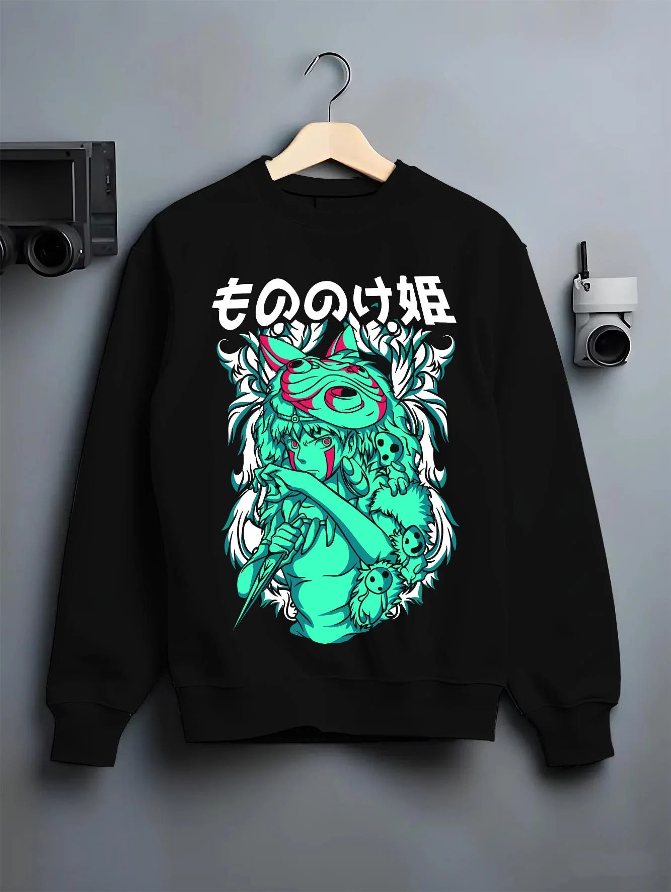 Black crewneck sweatshirt on hanger with Princess Mononoke Hoodie Studio Ghibli Wolf Girl graphic San themed artwork.