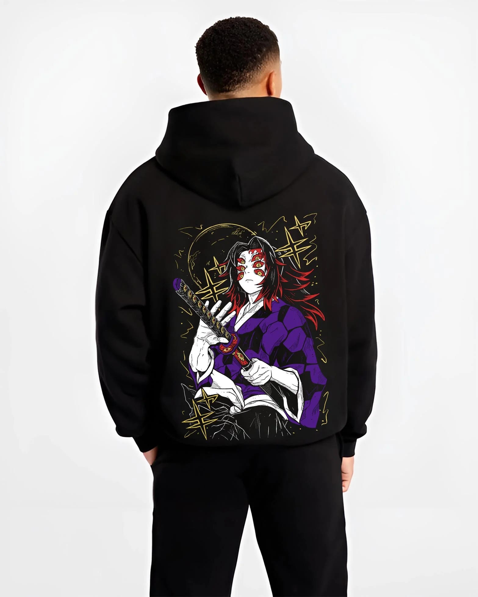 Black hoodie worn by male model, back view with Kokushibo Hoodie Demon Slayer Blood Moon Blade graphic bold anime graphic.