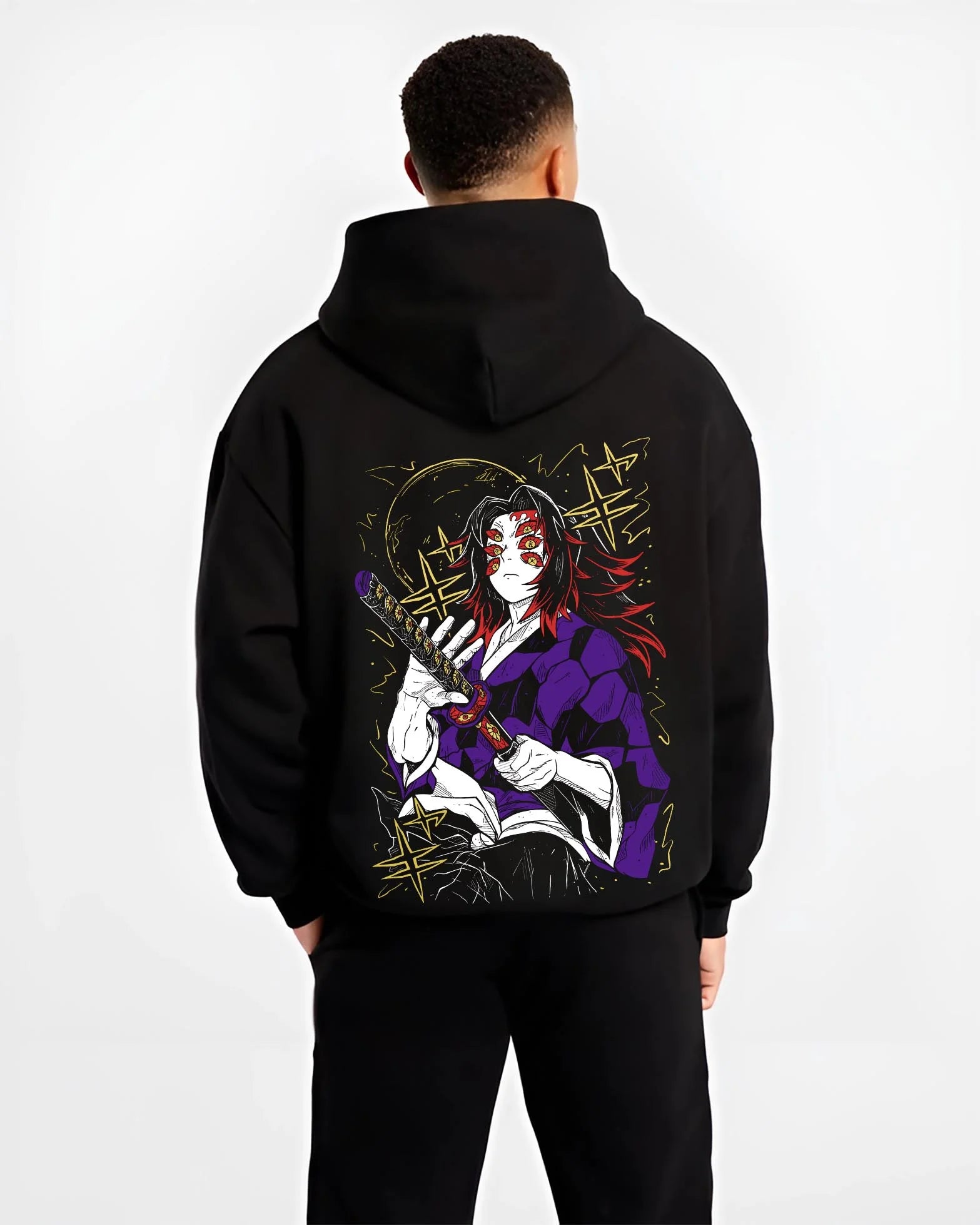 Black hoodie worn by male model, back view with Kokushibo Hoodie Demon Slayer Blood Moon Blade graphic bold anime graphic.
