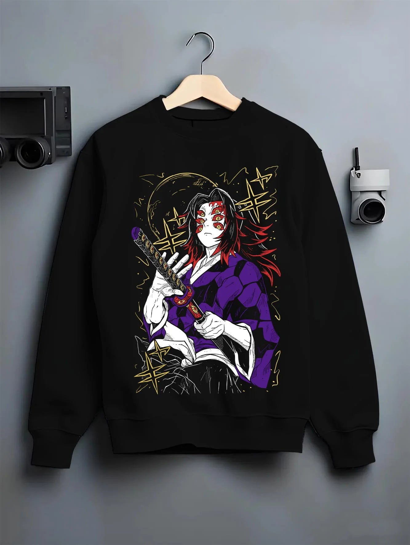 Black crewneck sweatshirt on hanger with Kokushibo Hoodie Demon Slayer Blood Moon Blade graphic premium wear.