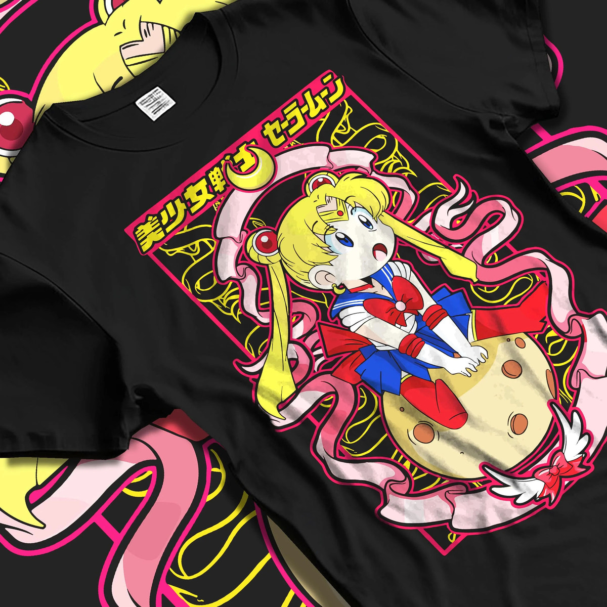 Black T-shirt laid flat with natural folds featuring Sailor Moon Eternal form artwork.