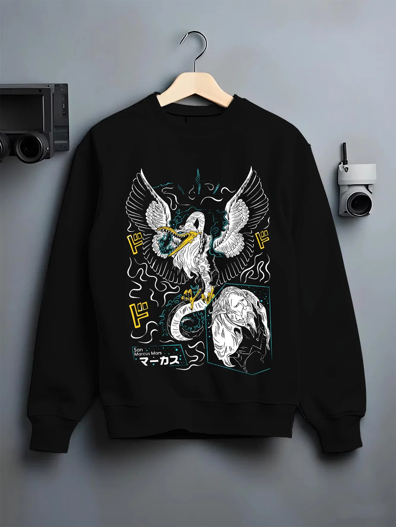 Black crewneck sweatshirt on hanger with Marcus Hoodie Saint Seiya Mythical Phoenix Armor graphic Marcus anime design.