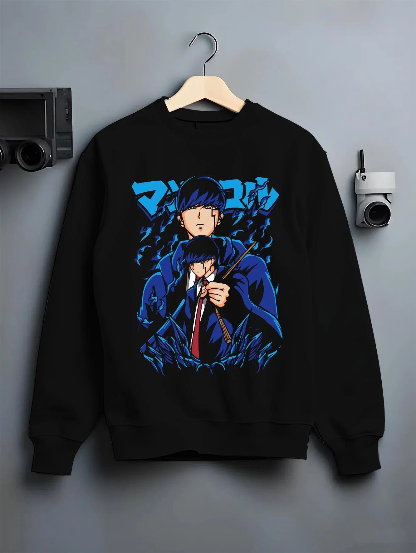 Black crewneck sweatshirt on hanger with Mob Psycho Hoodie Mob Psycho 100 Blue Energy graphic bold anime graphic.