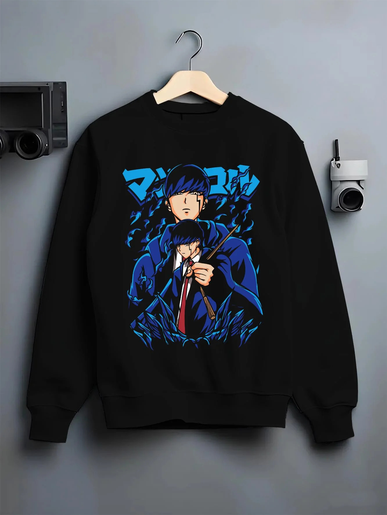 Black crewneck sweatshirt on hanger with Mob Psycho Hoodie Mob Psycho 100 Blue Energy graphic bold anime graphic.