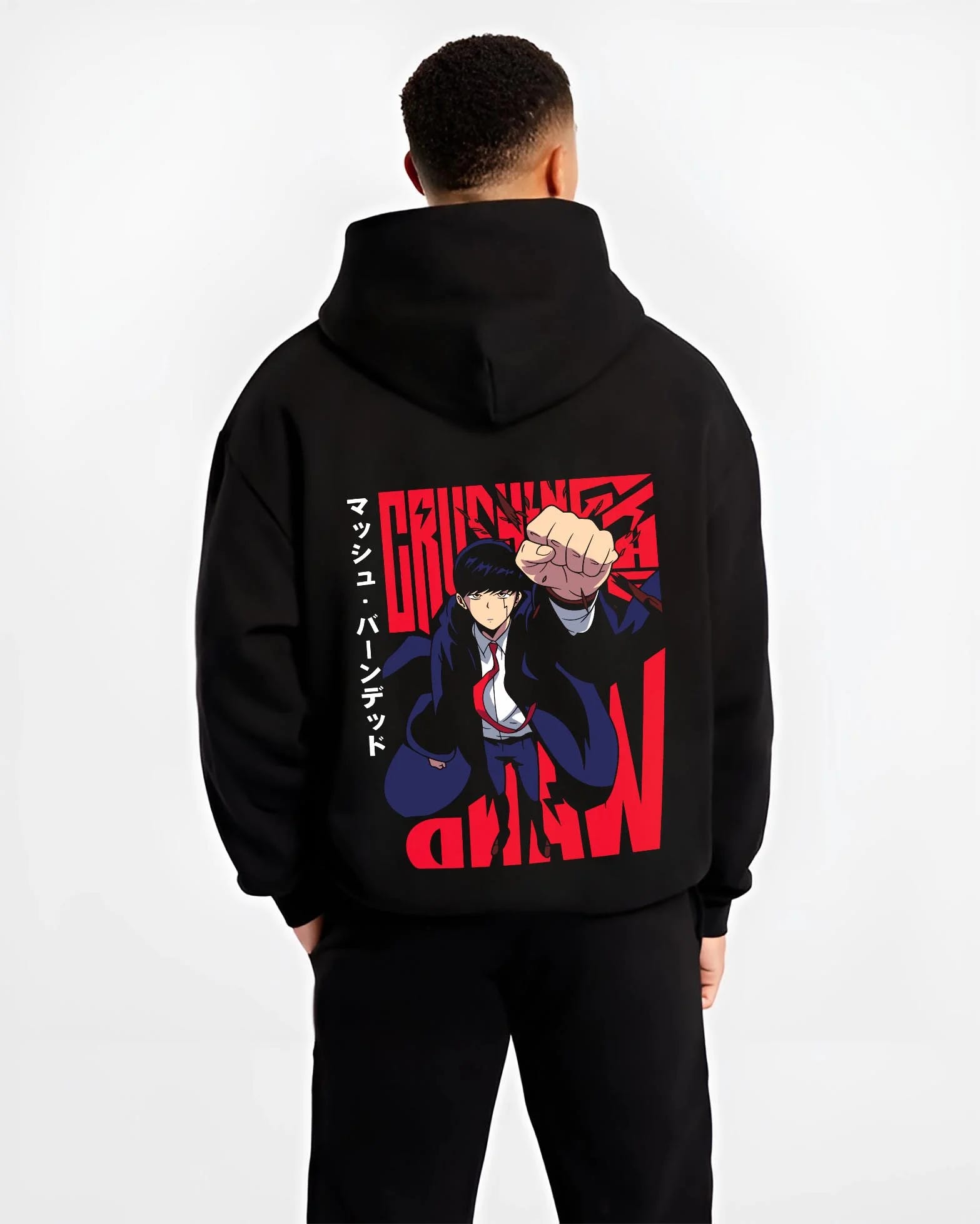 Black hoodie worn by male model, back view with Mash Burnedead Hoodie Mashle Power Fist graphic streetwear graphic.
