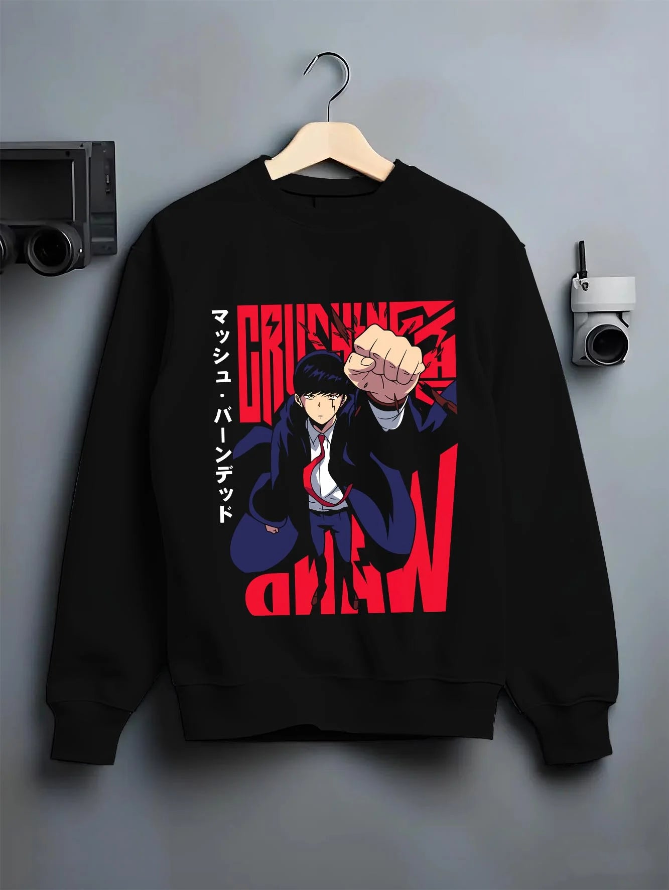 Black crewneck sweatshirt on hanger with Mash Burnedead Hoodie Mashle Power Fist graphic versatile unisex fit.