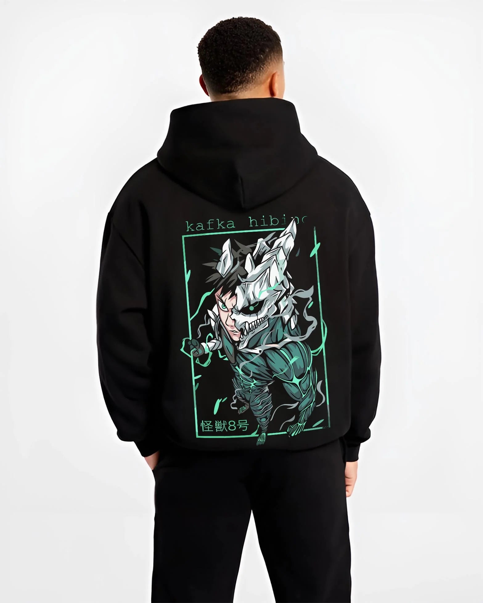 Black hoodie worn by male model, back view with Kafka Hibino Hoodie Kaiju No. 8 Monster Form graphic bold anime graphic.