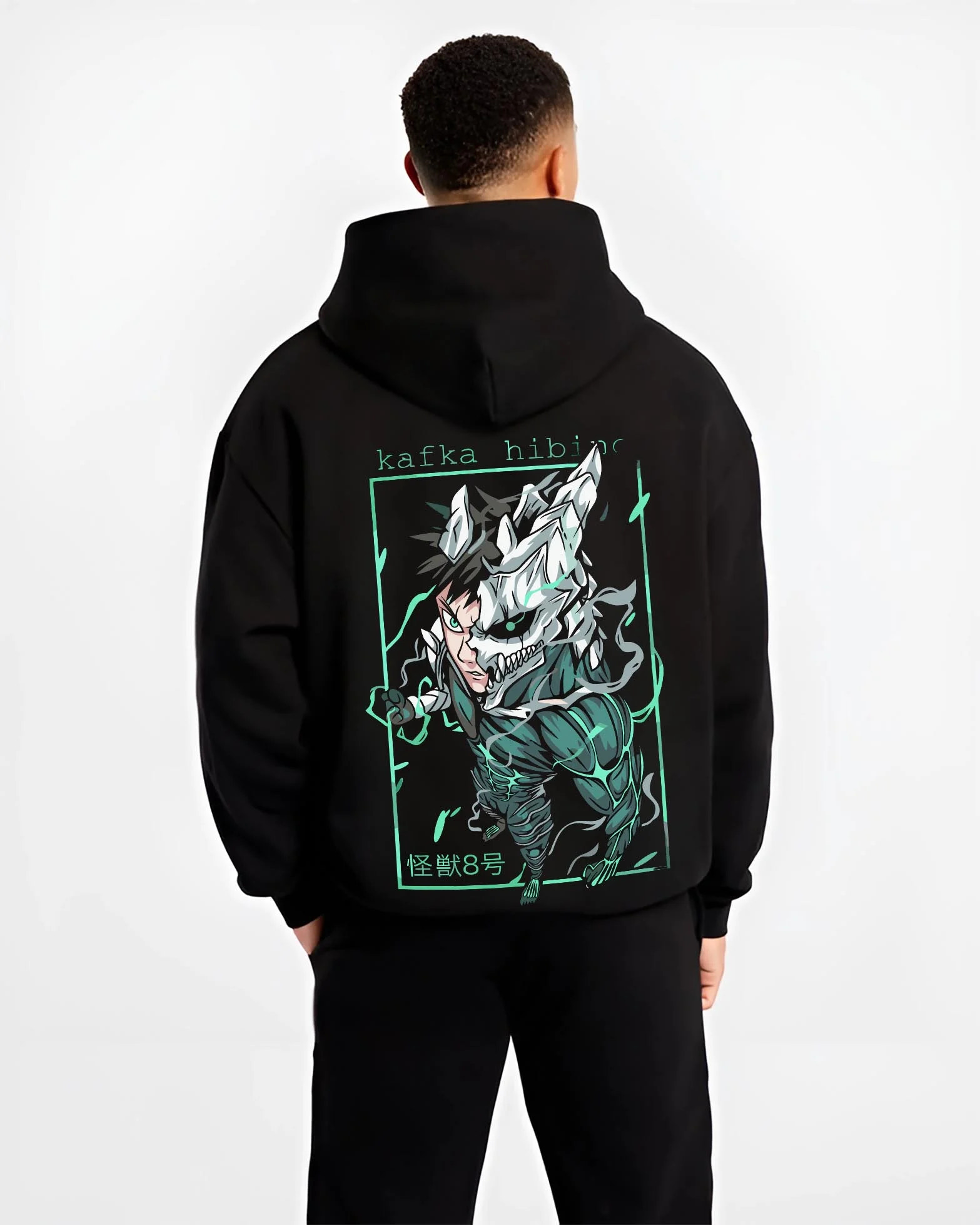 Black hoodie worn by male model, back view with Kafka Hibino Hoodie Kaiju No. 8 Monster Form graphic bold anime graphic.