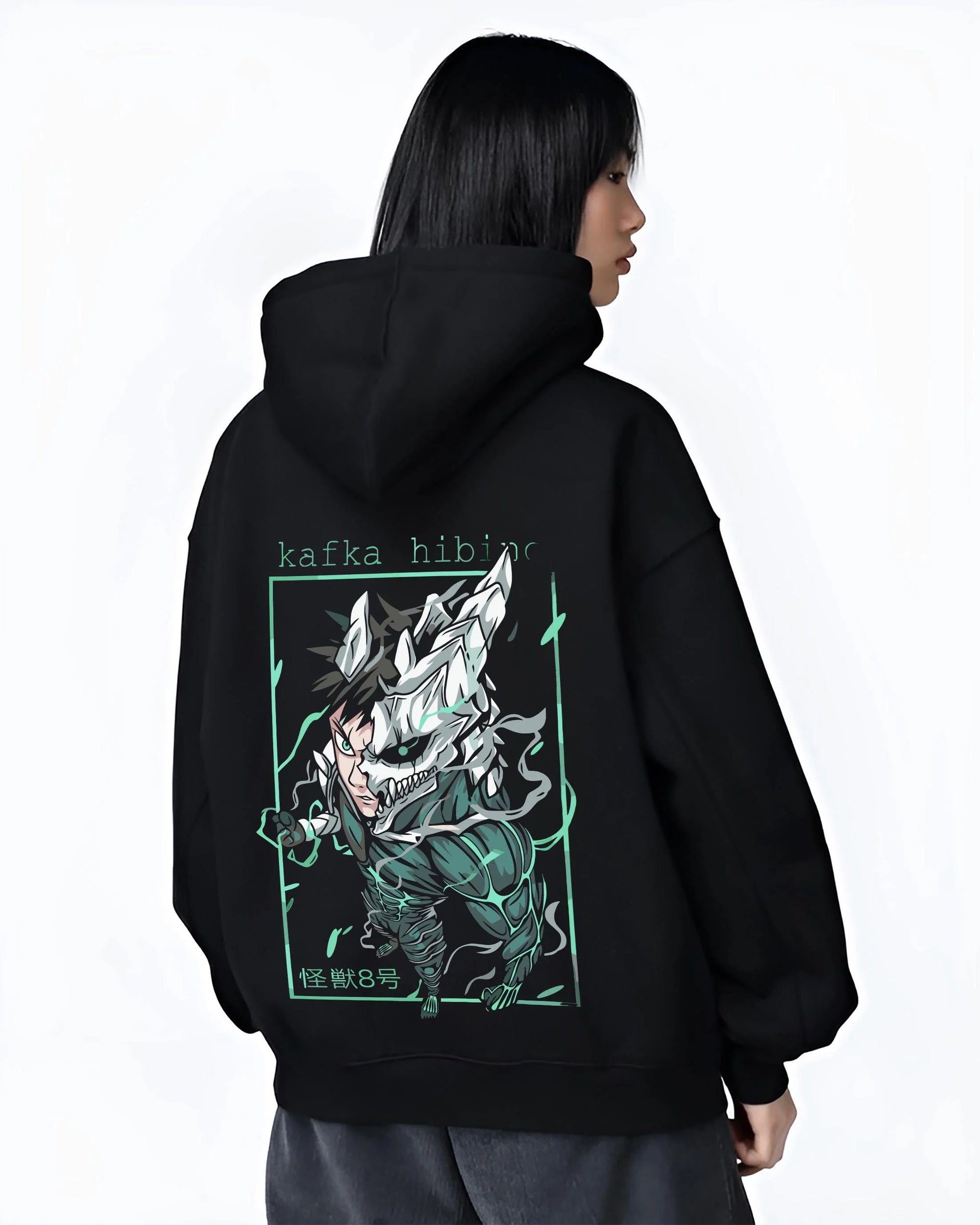 Black hoodie worn by female model, back view with Kafka Hibino Hoodie Kaiju No. 8 Monster Form graphic bold anime graphic.