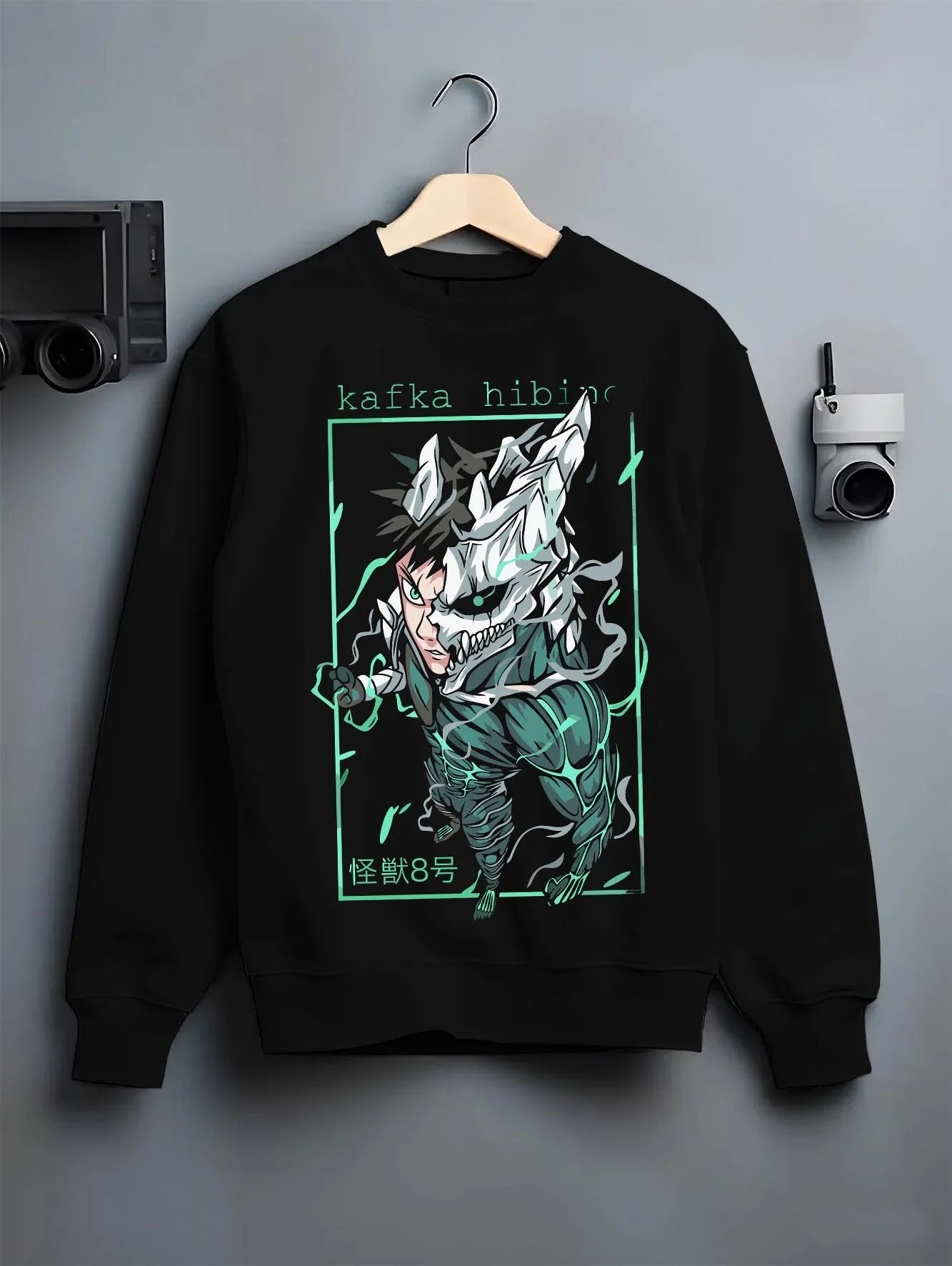 Black crewneck sweatshirt on hanger with Kafka Hibino Hoodie Kaiju No. 8 Monster Form graphic streetwear graphic.