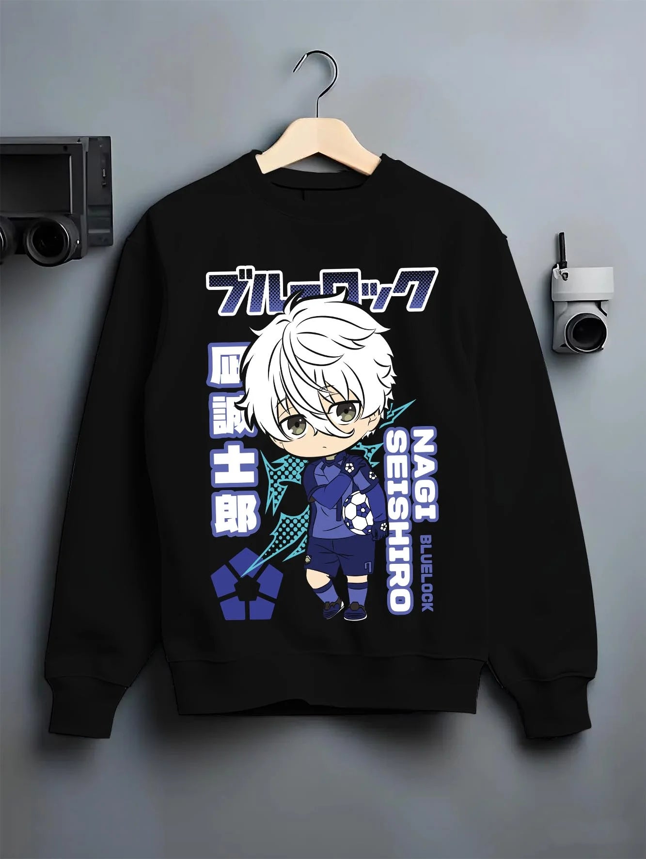 Black crewneck sweatshirt on hanger with Nagi Seishiro Hoodie Blue Lock Striker Icon graphic bold anime graphic.