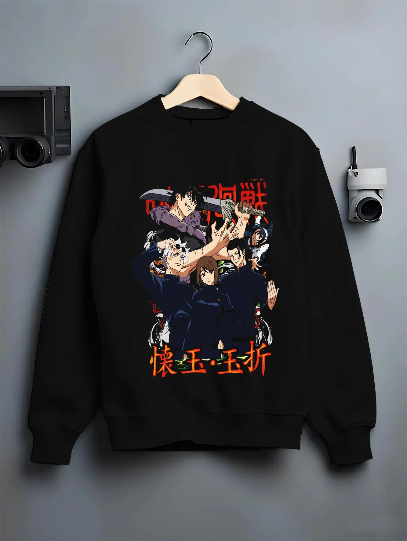 Black crewneck sweatshirt on hanger with Kento Nanami Hoodie Jujutsu Kaisen Sorcerer graphic streetwear graphic.