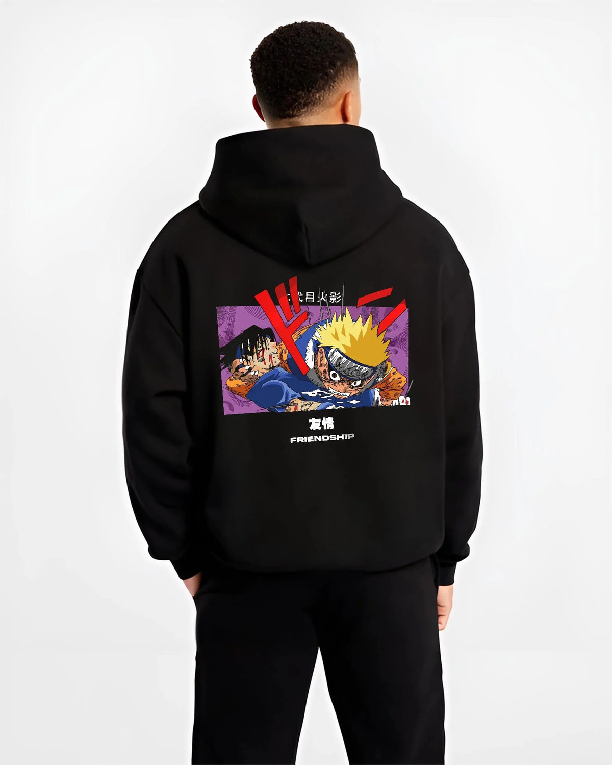 Black hoodie worn by male model from the back featuring Naruto and Sasuke friendship rivalry artwork.