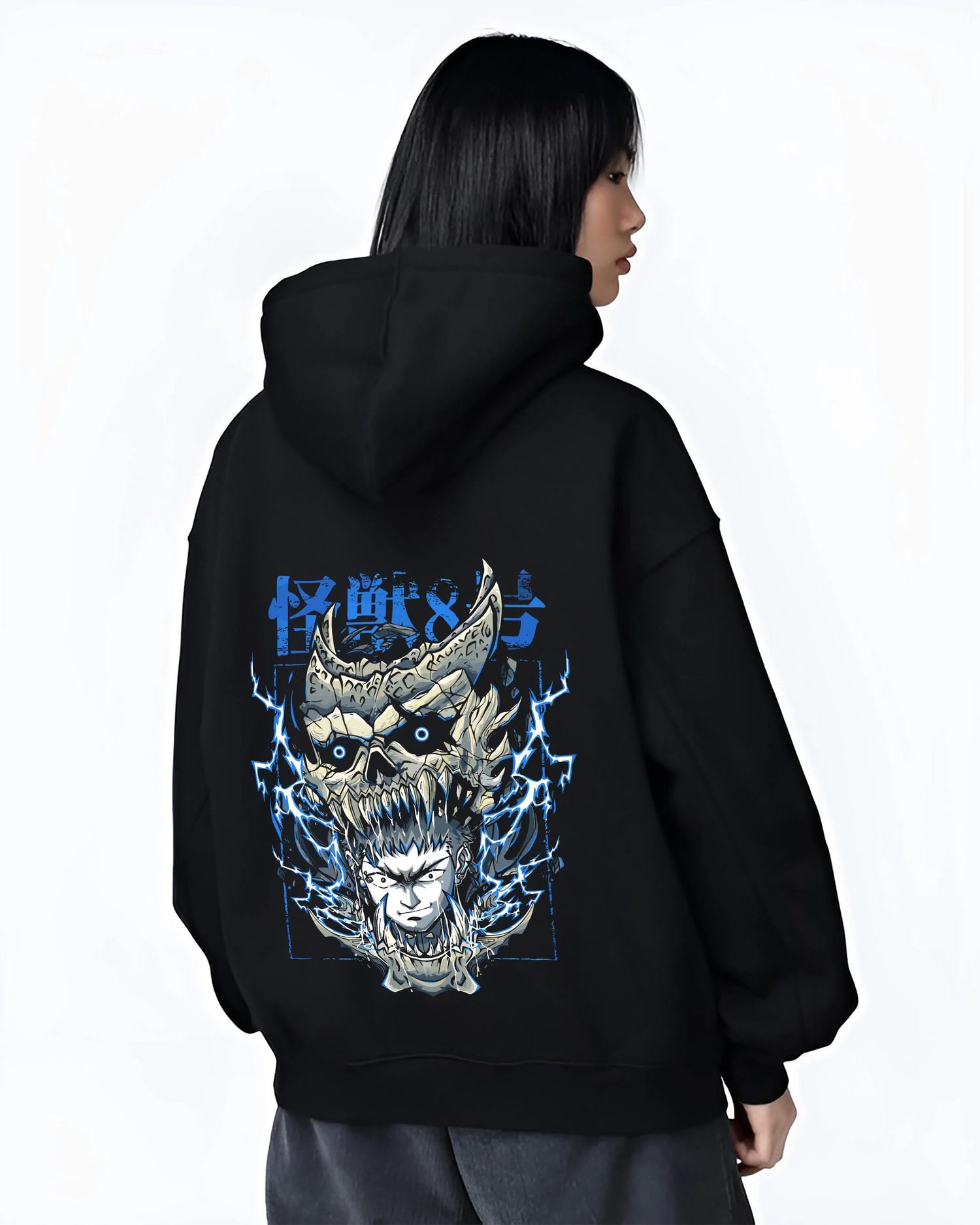Black hoodie worn by female model, back view with Narumi Hoodie Kaiju No. 8 Skull Transformation graphic premium wear.