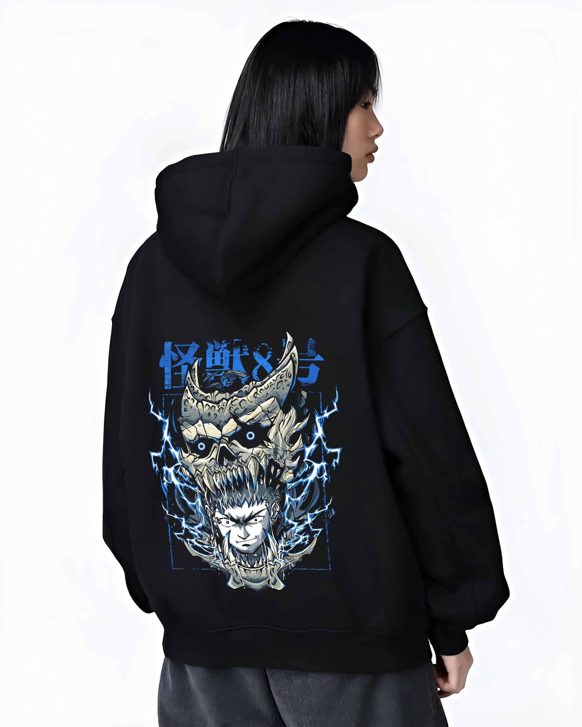 Black hoodie worn by female model, back view with Narumi Hoodie Kaiju No. 8 Skull Transformation graphic premium wear.
