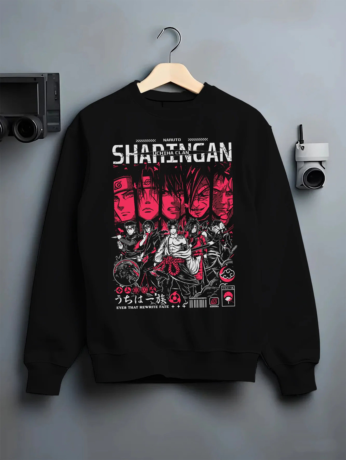 Black crewneck sweatshirt on hanger showing Naruto: Uchiha clan and Itachi character montage
