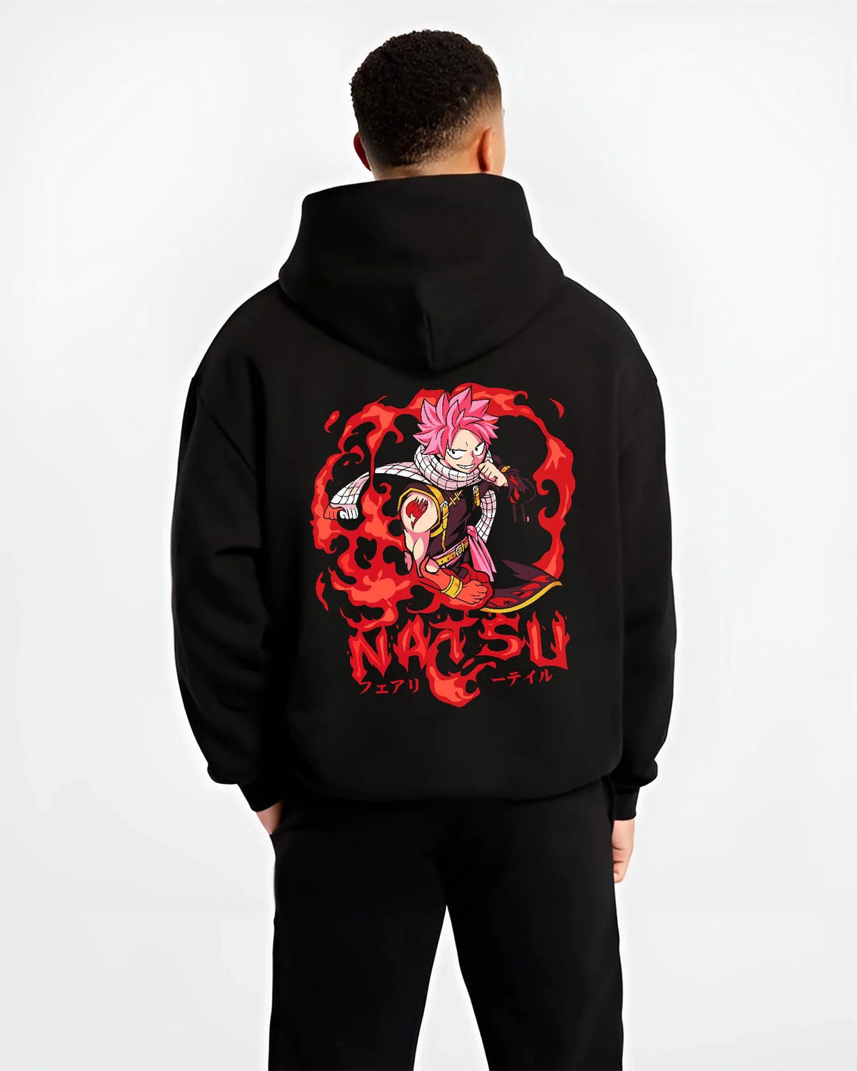 Black hoodie worn by male model from the back featuring Natsu Dragneel Fire Dragon Slayer artwork.