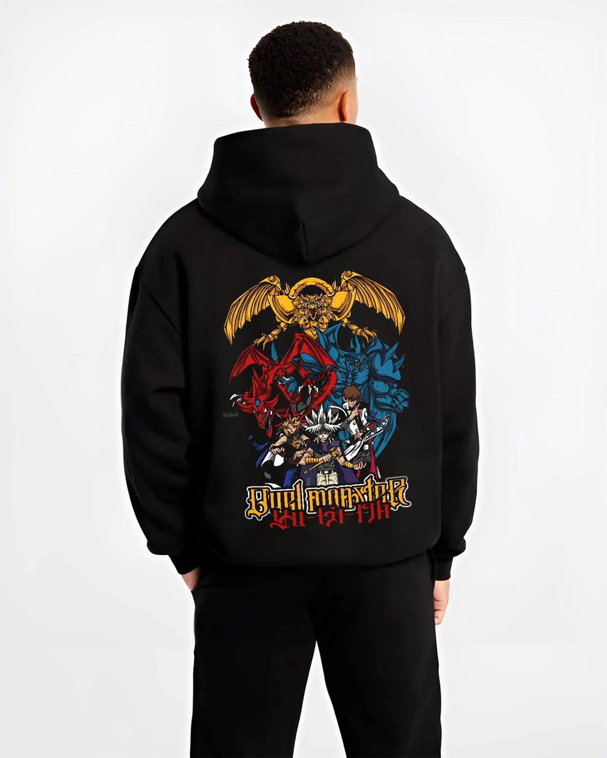 Black hoodie worn by male model from the back featuring Obelisk the Tormentor Egyptian God Yu-Gi-Oh! artwork.